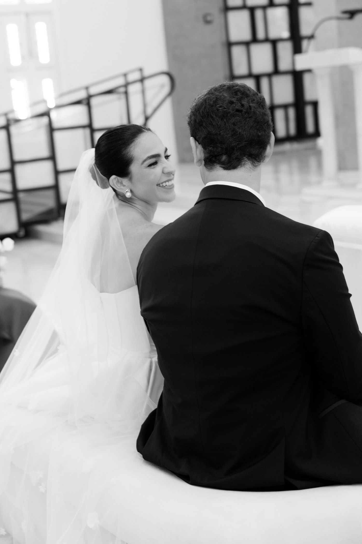 Black and white photo sequence showing a romantic dance at a wedding reception.
