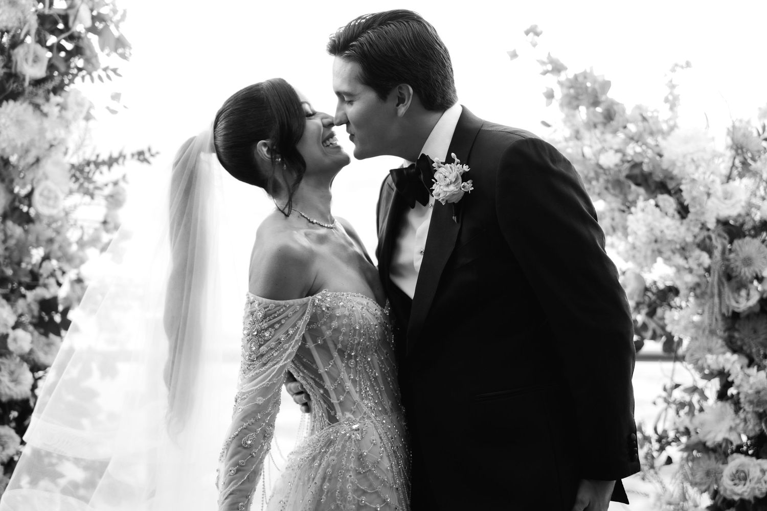 A romantic black and white couples portrait from their wedding in soft natural light.