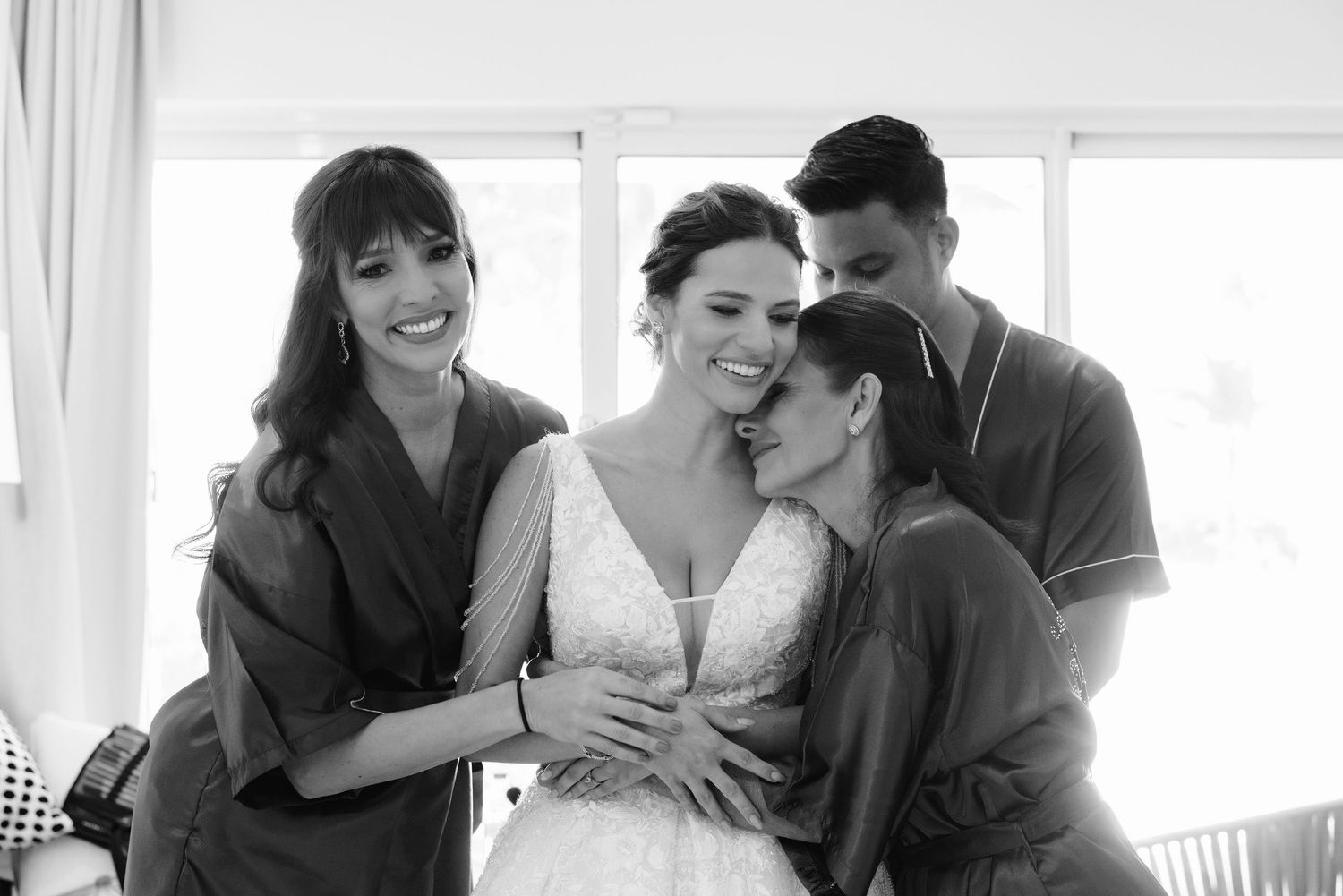 Black and white intimate candid photographs showing tender personal moments between couples.