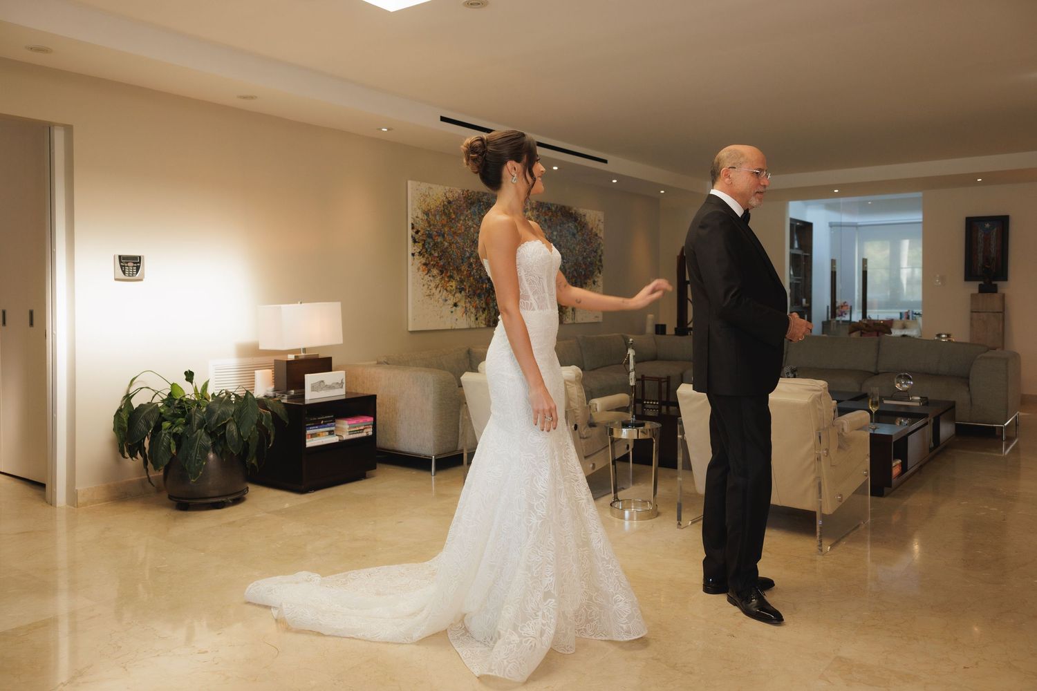 A series of photos showing a wedding dress fitting in a bright, modern retail space with large mirrors and white walls.