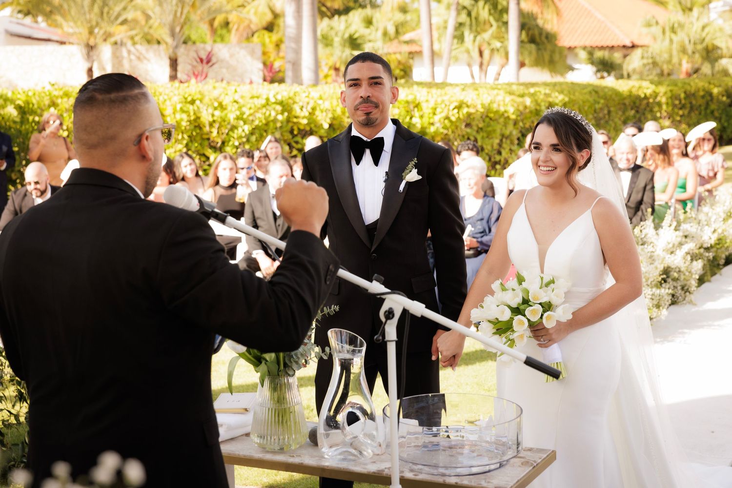 A panoramic view of multiple wedding ceremony moments showing couples and guests celebrating in an outdoor setting.