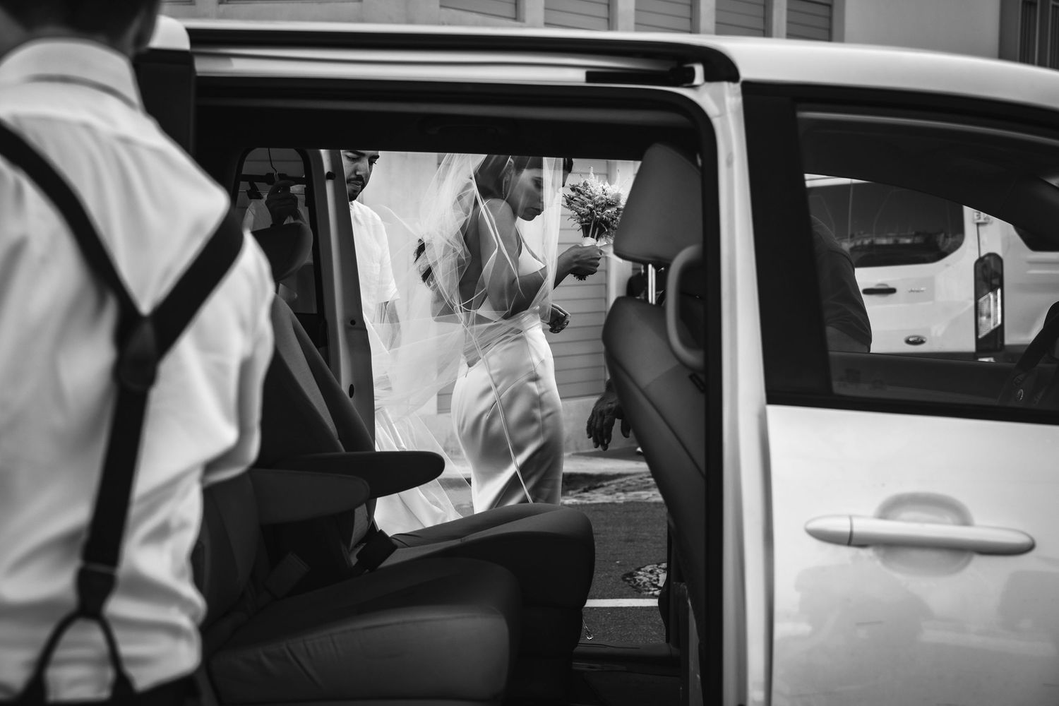 A series of black and white wedding photos showing two people getting into a car after their ceremony.