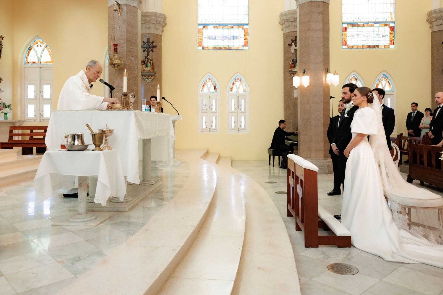 A collection of wedding photos showing a bright church interior with white gowns and decorative stained glass windows.