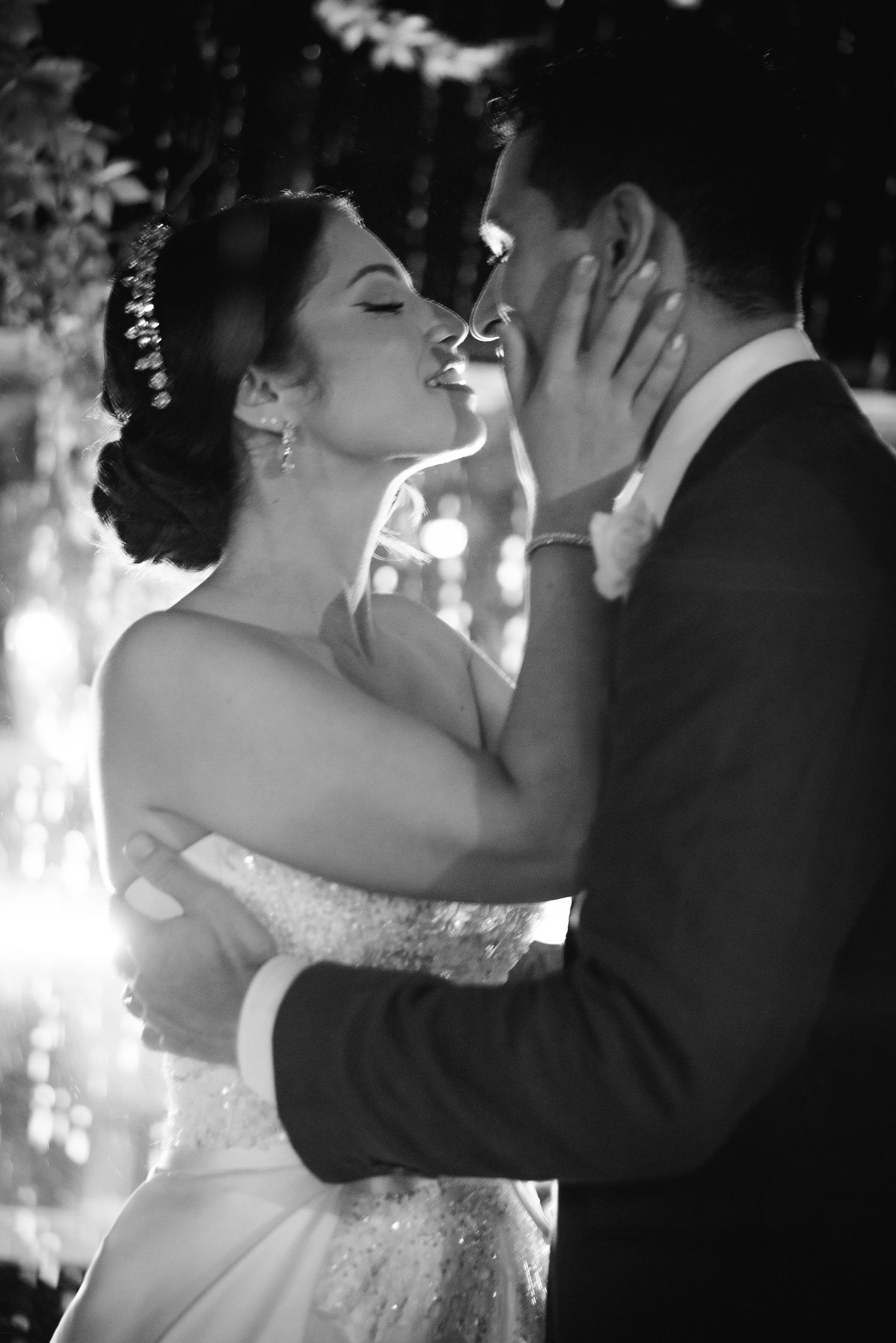 Black and white photo series captures tender moments between newlyweds during their first dance.