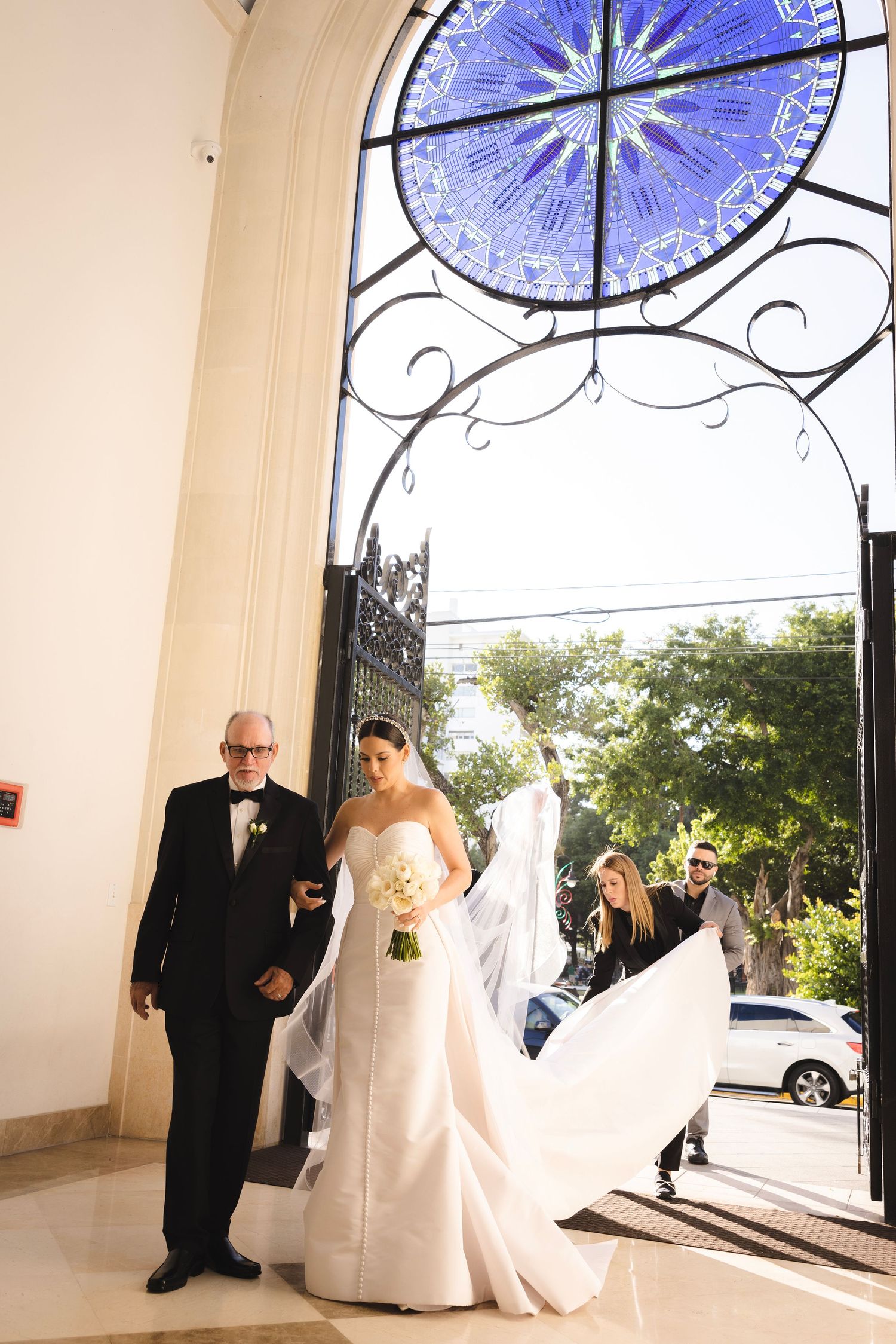 Five sequential photos showing a bride and escort entering through church doors with decorative stained glass windows.