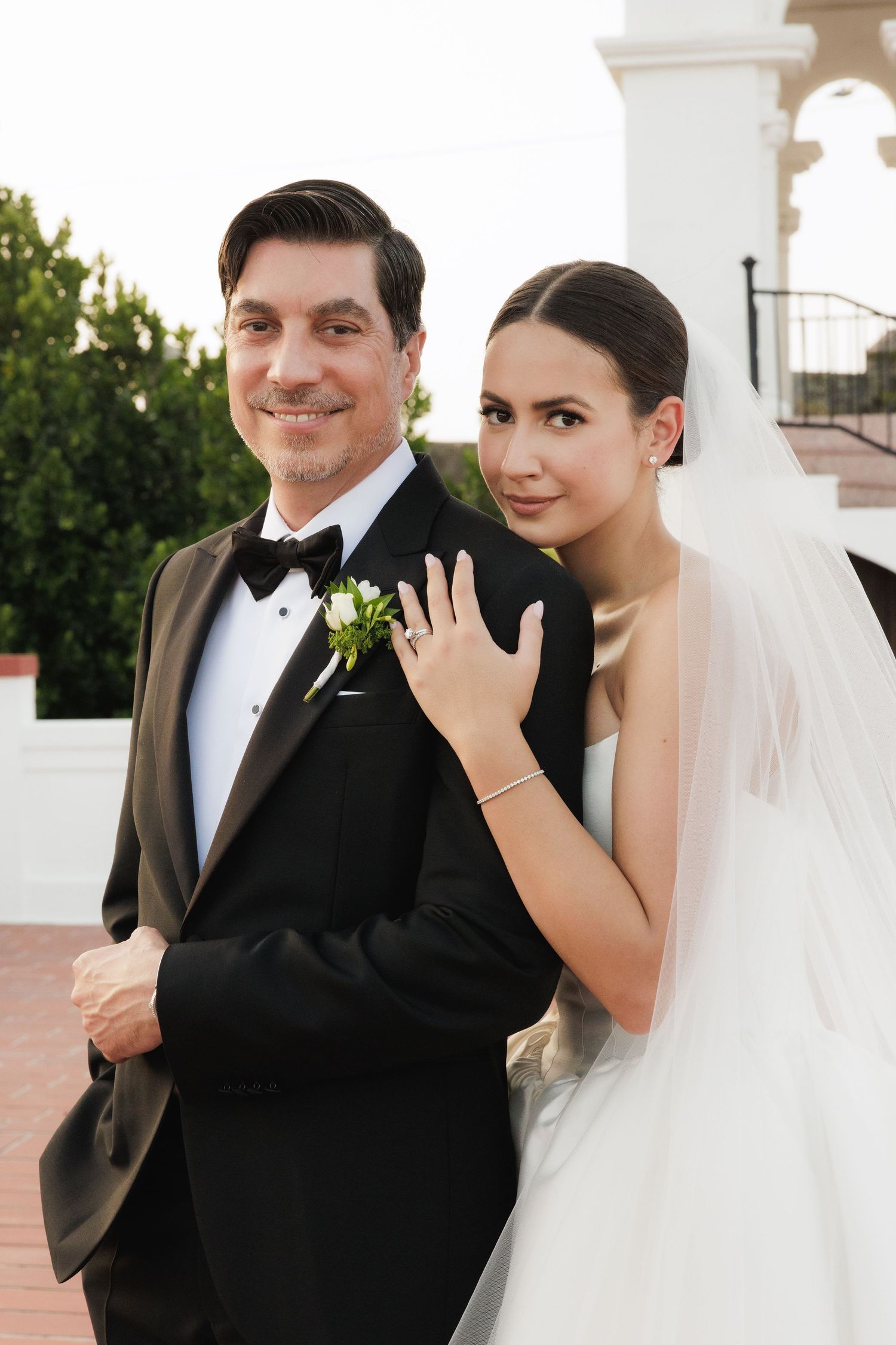 Candid wedding moments captured in a series of intimate portraits.