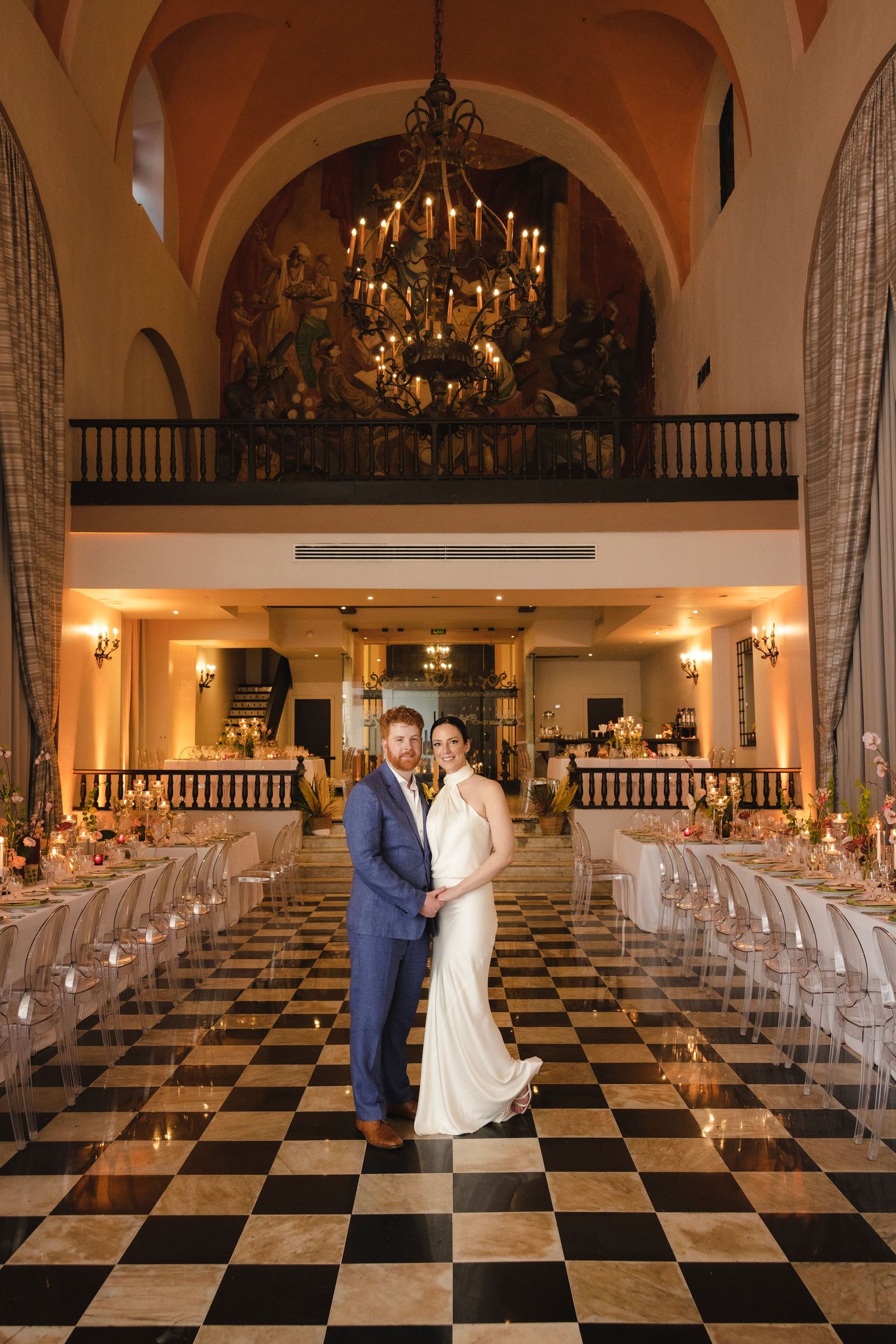 Four sequential images of an elegant ballroom with a black and white checkered floor and ornate chandeliers.