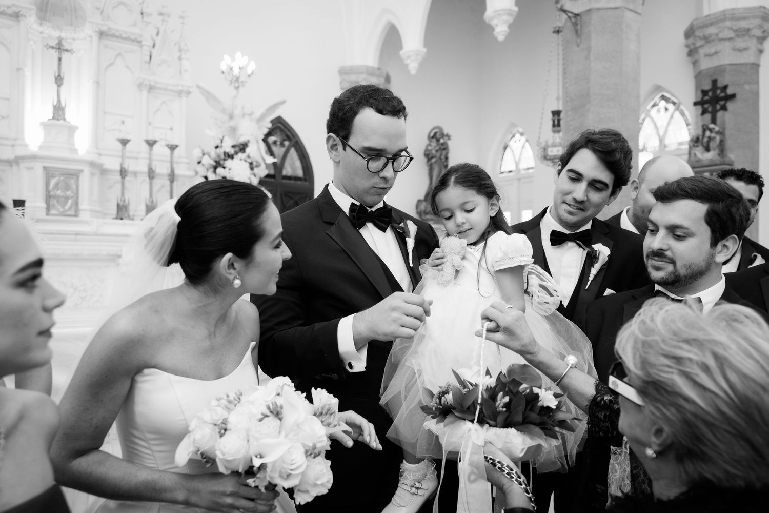Joyful wedding celebration sequence showing guests and couple dancing in a church setting.
