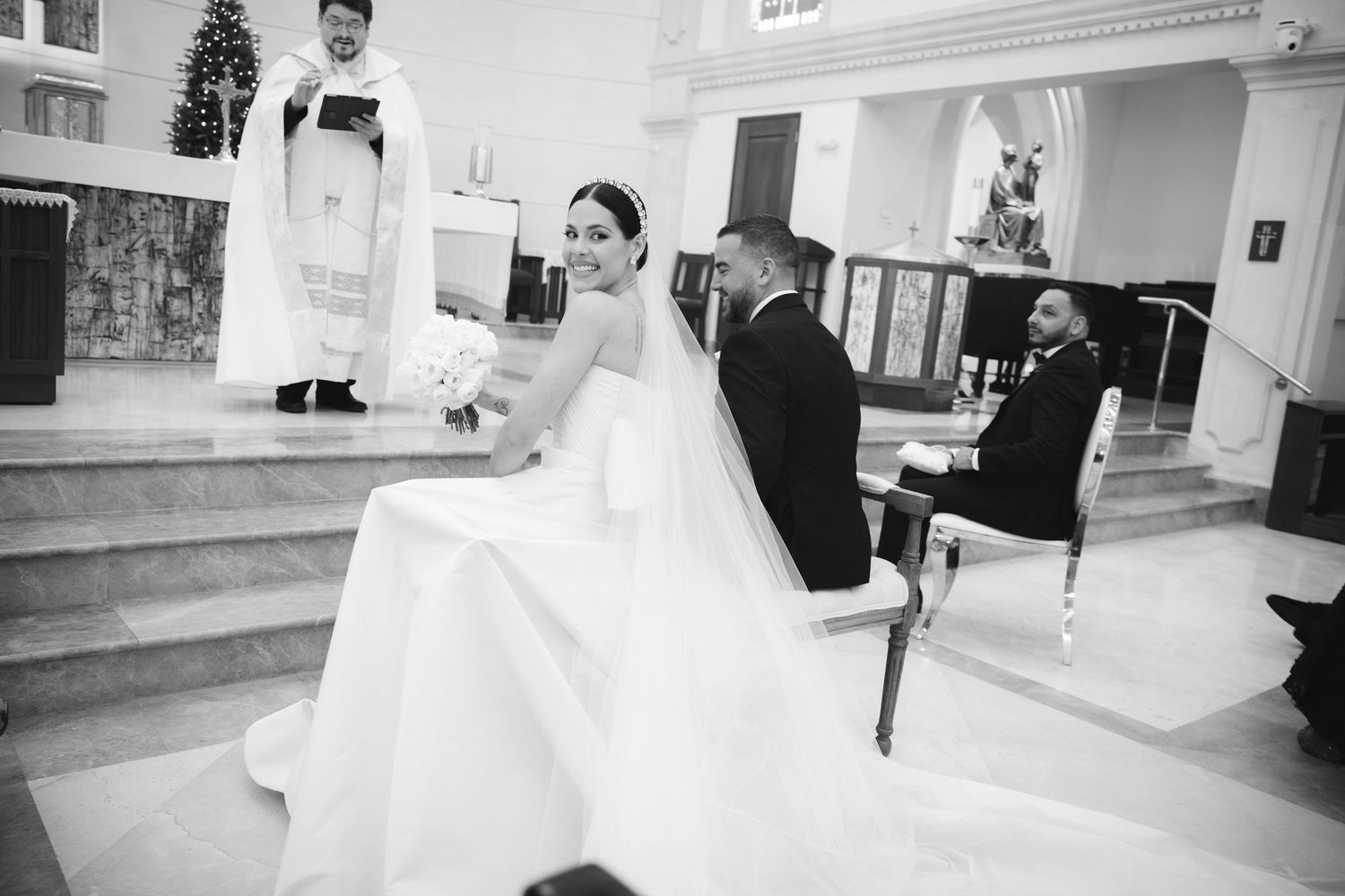 A black and white series of photographs showing a bride in her wedding gown and dress fittings at a bridal salon.