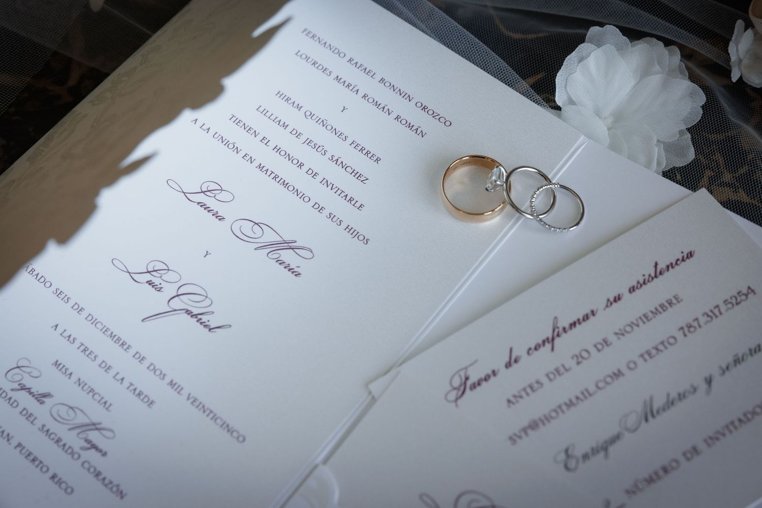A collection of elegant wedding invitations and paper cards displayed in a row showing romantic design elements.