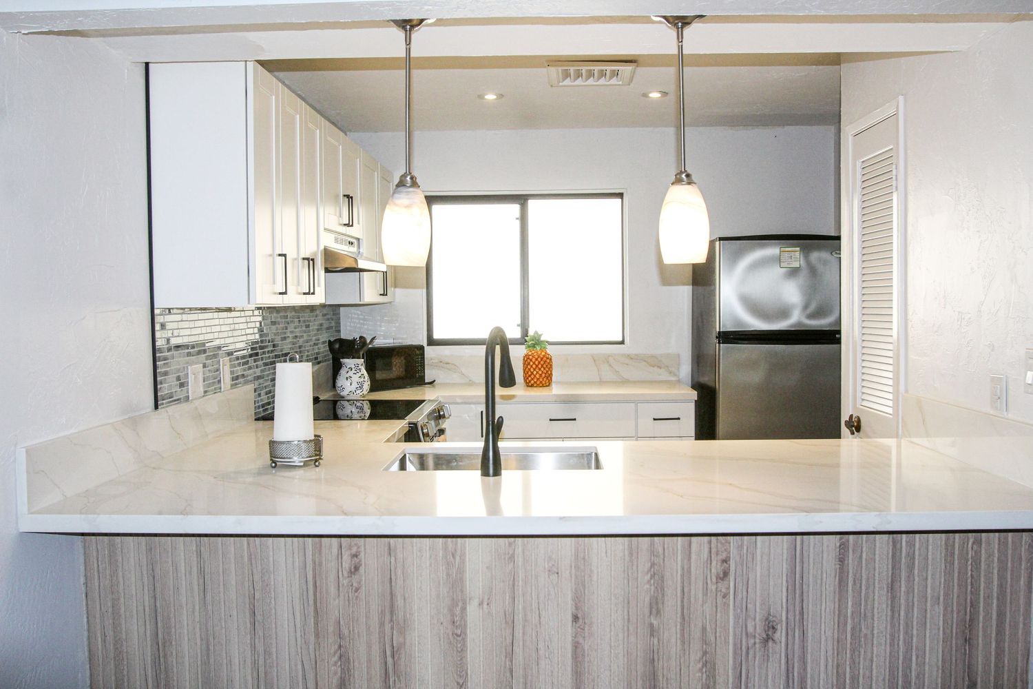 Bright open concept kitchen in Airbnb home on Big Island Hawaii