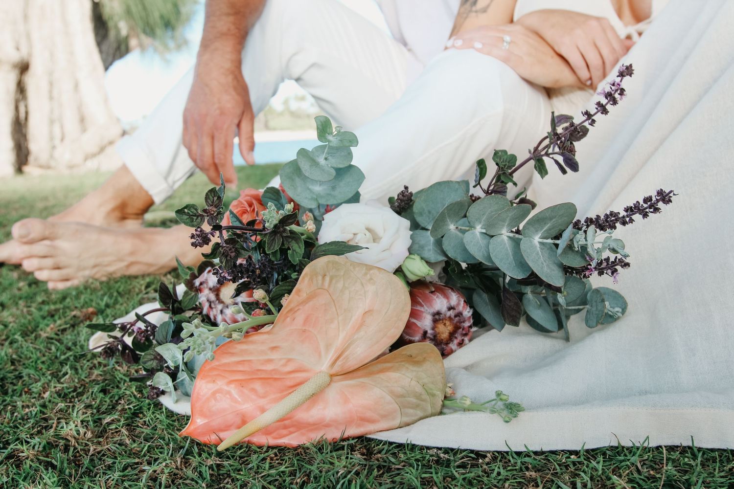Elopement wedding detail shot floral picnic setup Four Seasons Big Island Hawaii photographer