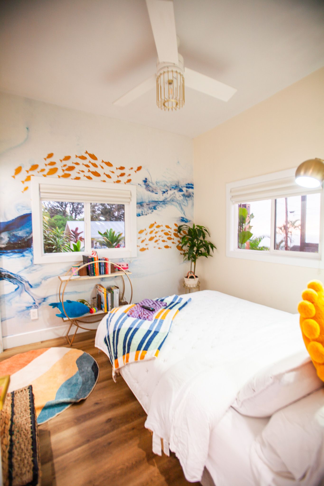 Bed detail with neutral styling in vacation rental Hawaii