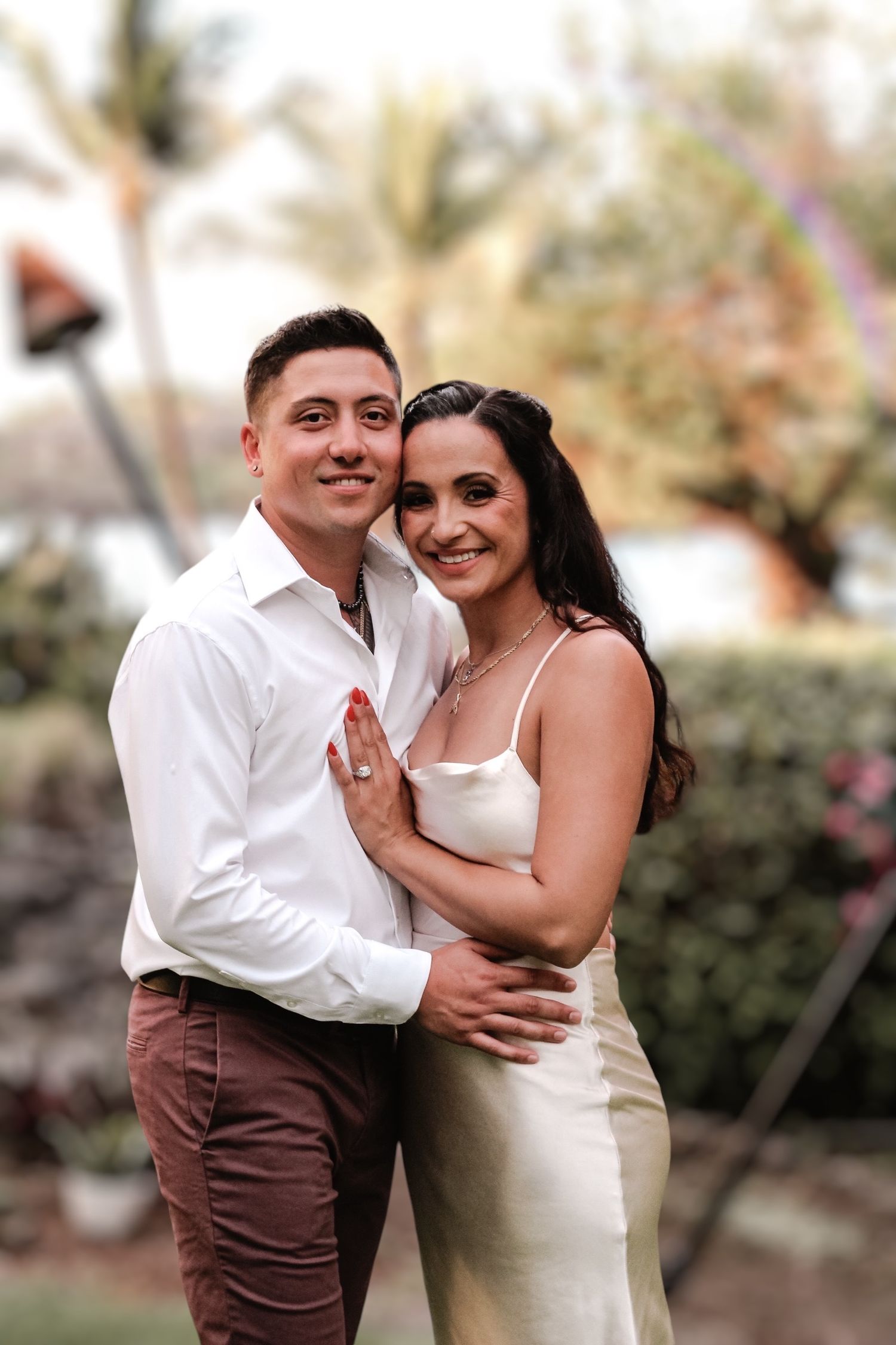 Elopement ceremony couple posing in garden at Outrigger Kona Resort Hawaii
