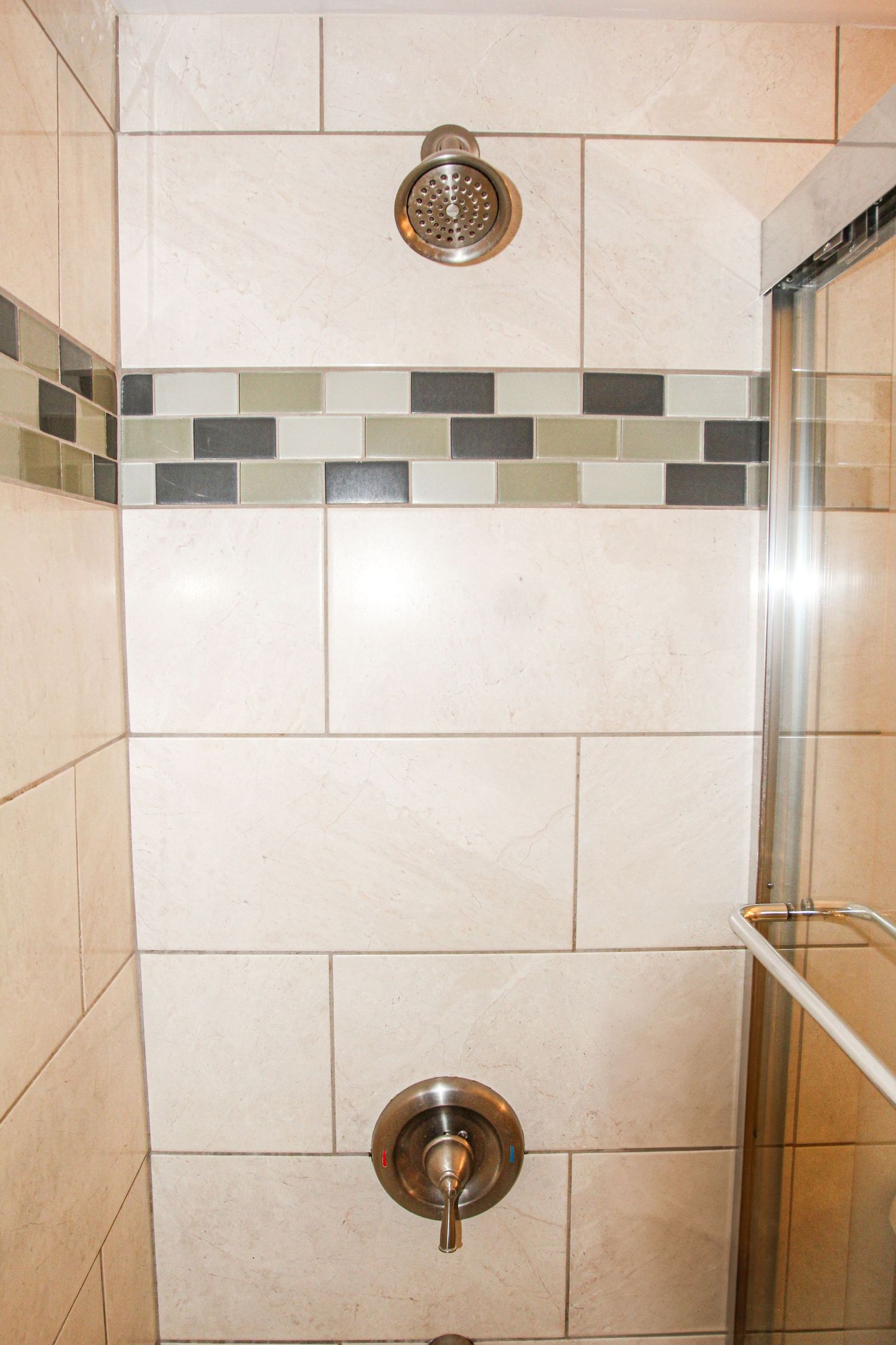 Shower Bathroom detail of older Airbnb property in Hawaii with clean design