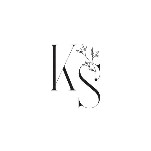 Elegant KS monogram logo with delicate botanical leaf illustration in black ink.