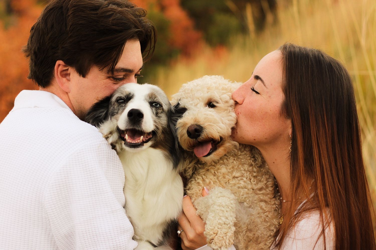 Stephanie and Trey with their sweet dogs, Pepper and Roo.