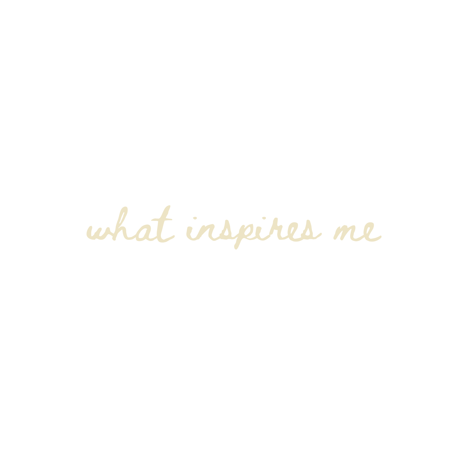 Elegant cursive gold text reading 'what inspires me' on a white background.