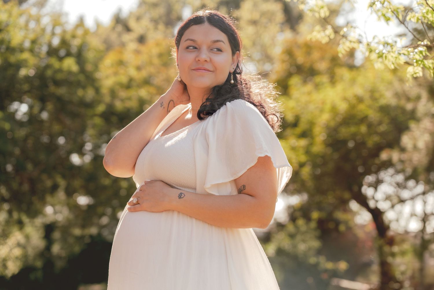 A romantic outdoor photoshoot featuring gentle poses and soft lighting.