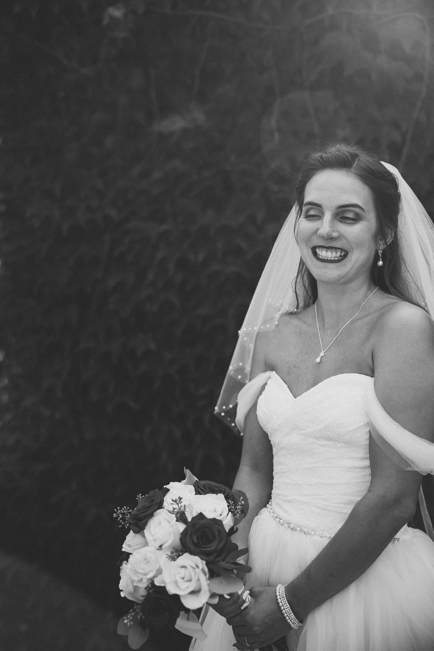 A series of black and white wedding photos showing a bride in a white dress holding a bouquet of roses.