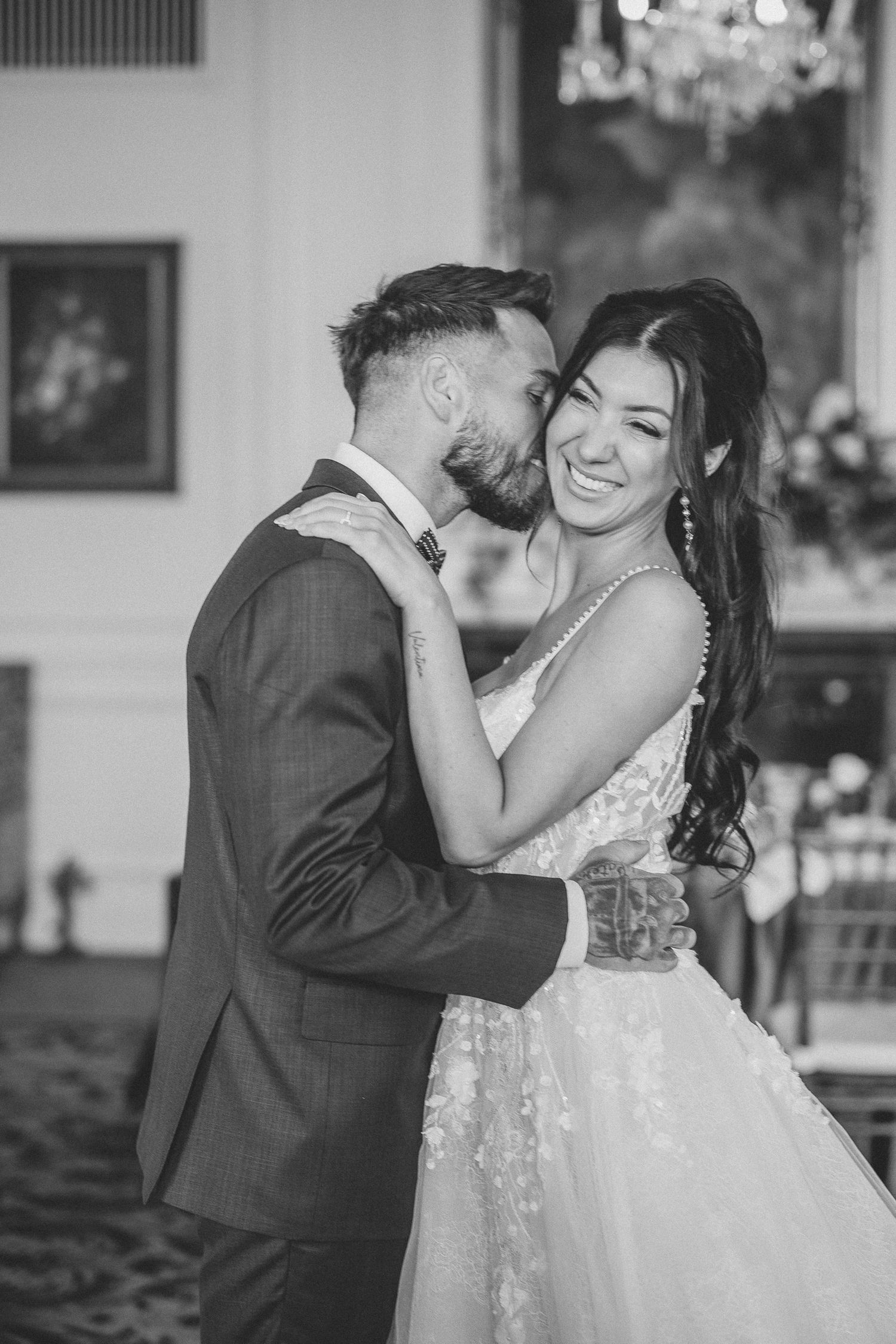 A romantic black and white wedding photo series showing a couple dancing and embracing during their first dance.