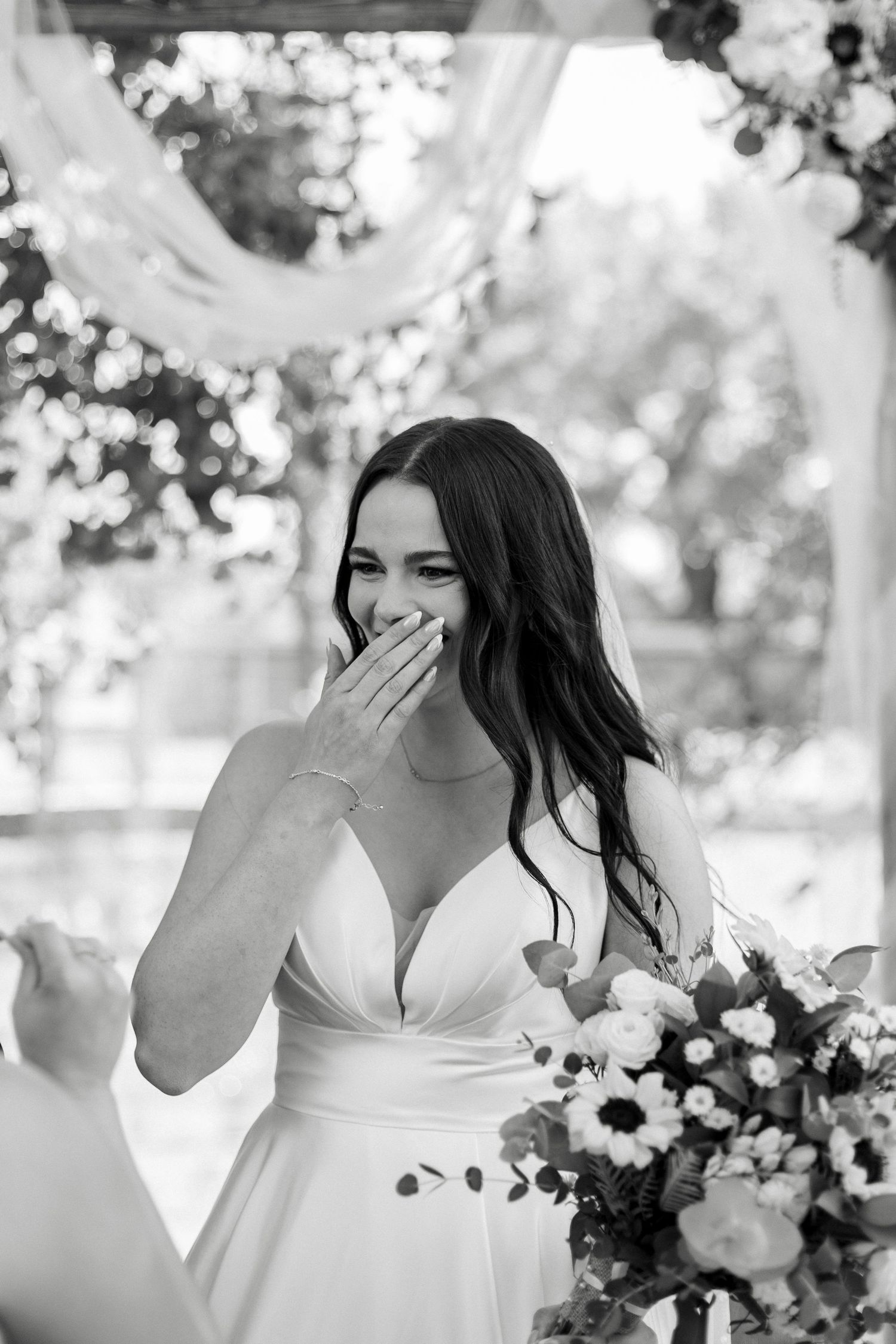 Black and white series showing joyful reactions during wedding ceremony.