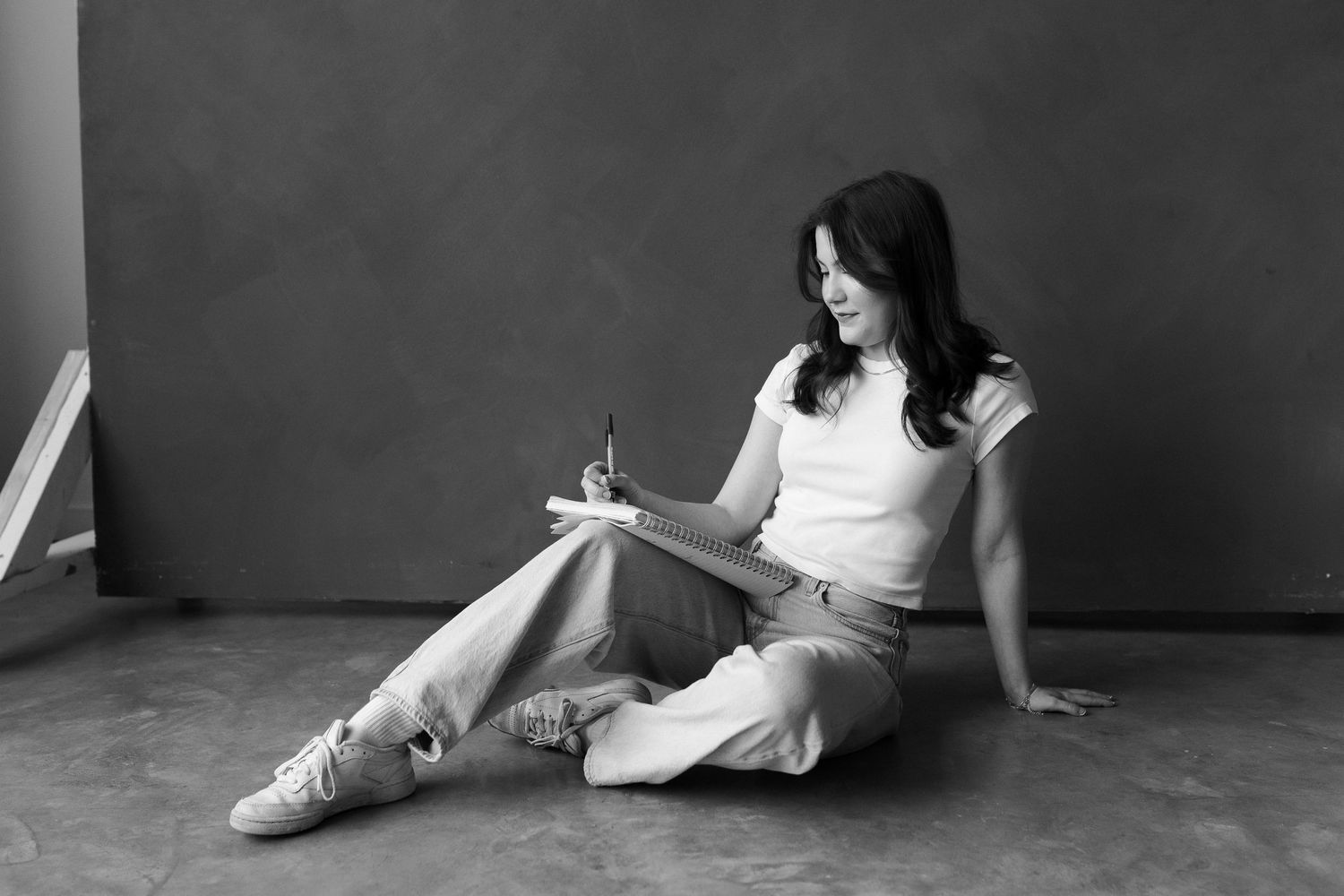Artistic black and white portraits showing casual poses.