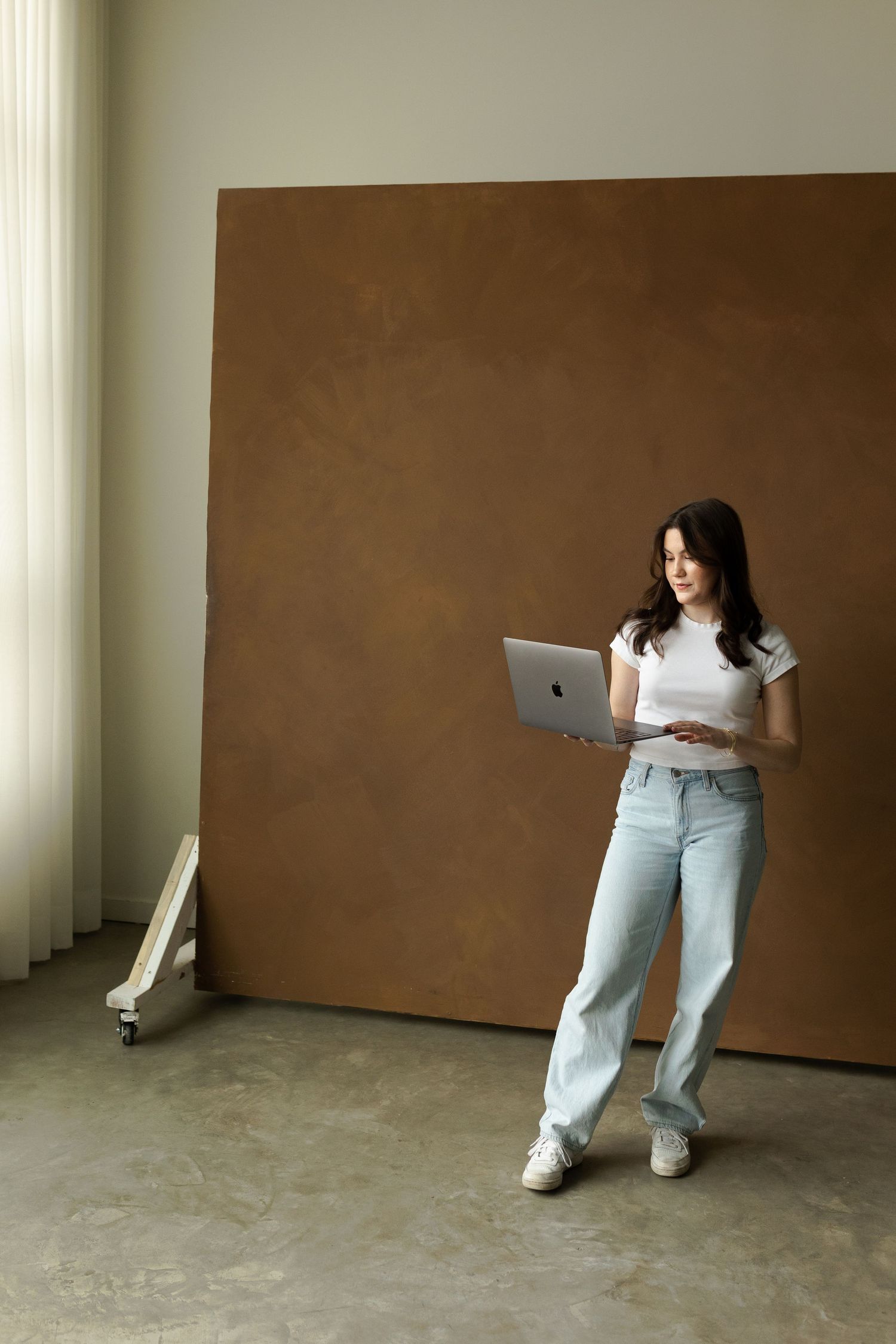 Lifestyle portraits showing casual poses against changing backdrops.