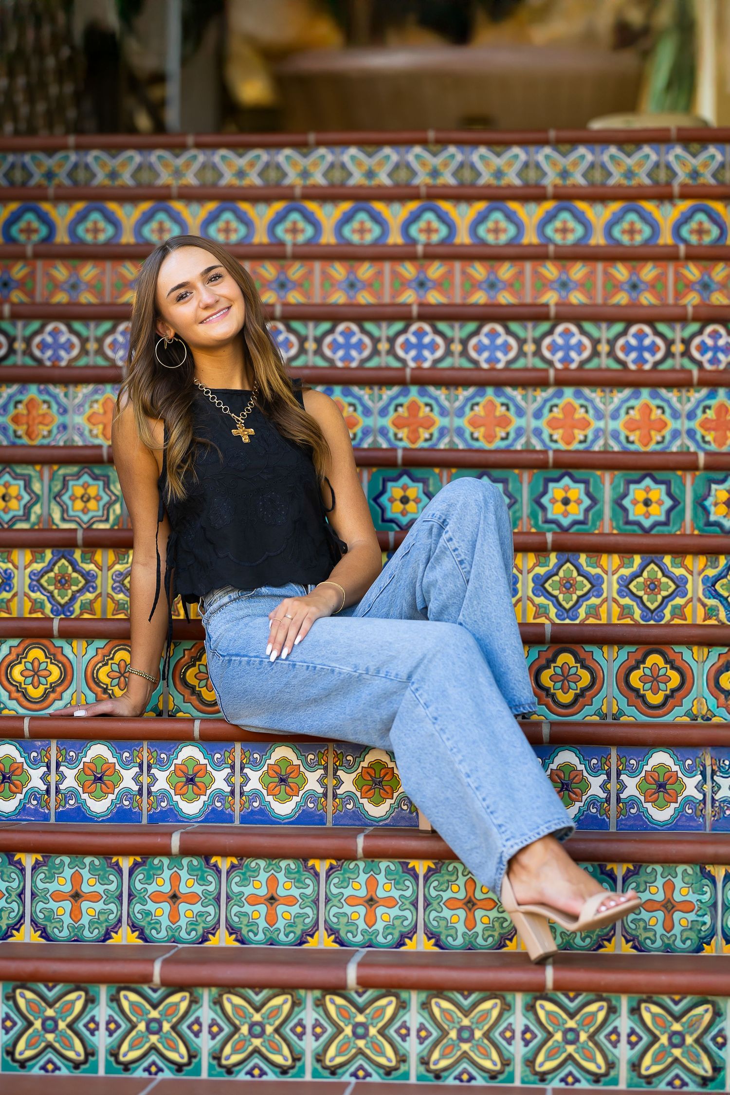 Casual senior pictures decorative tiled steps denim and black top - Highland Park Village