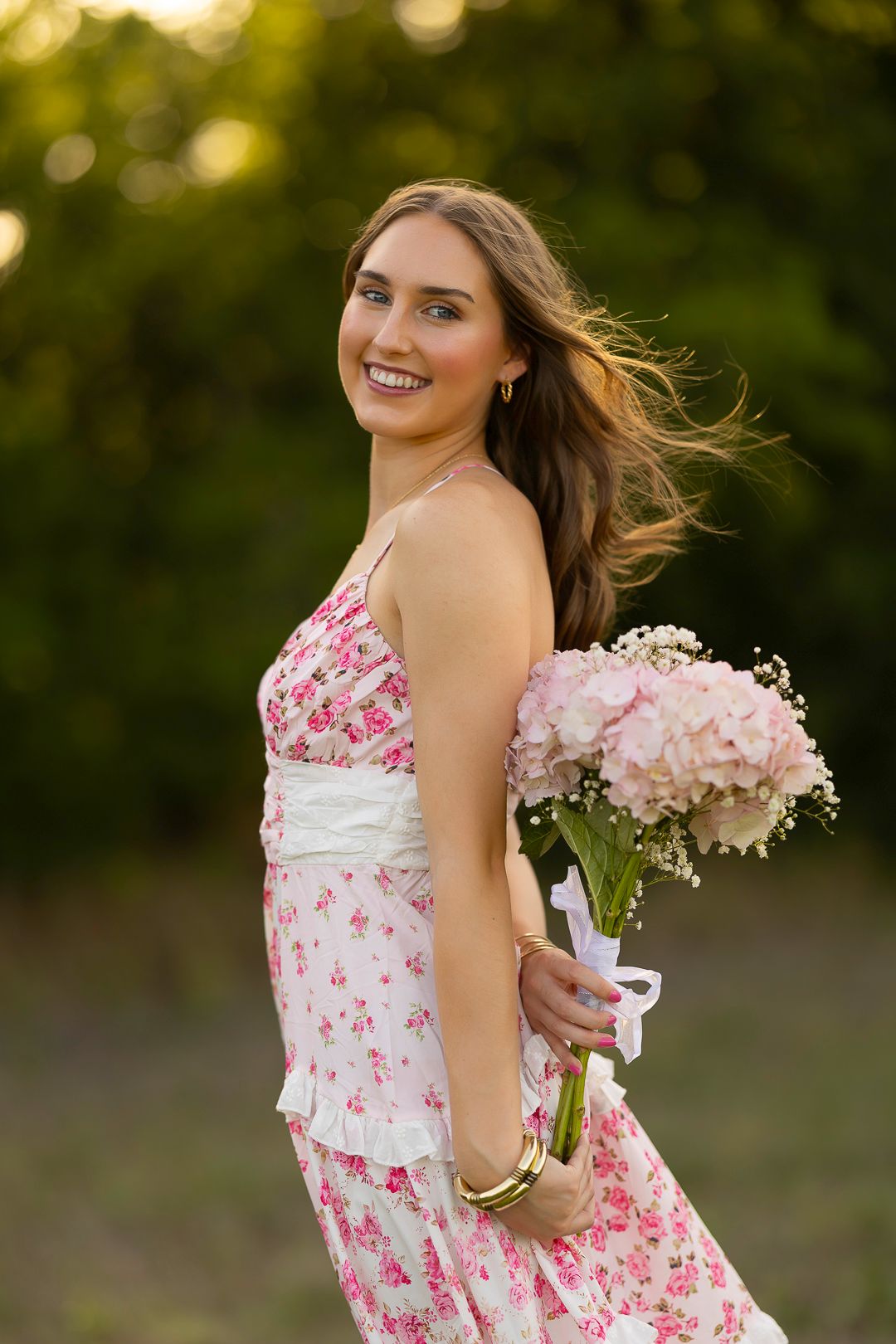 Senior Portrait idea - pink patchwork dress with flowers during golden hour.  Tall grass Frisco Texas