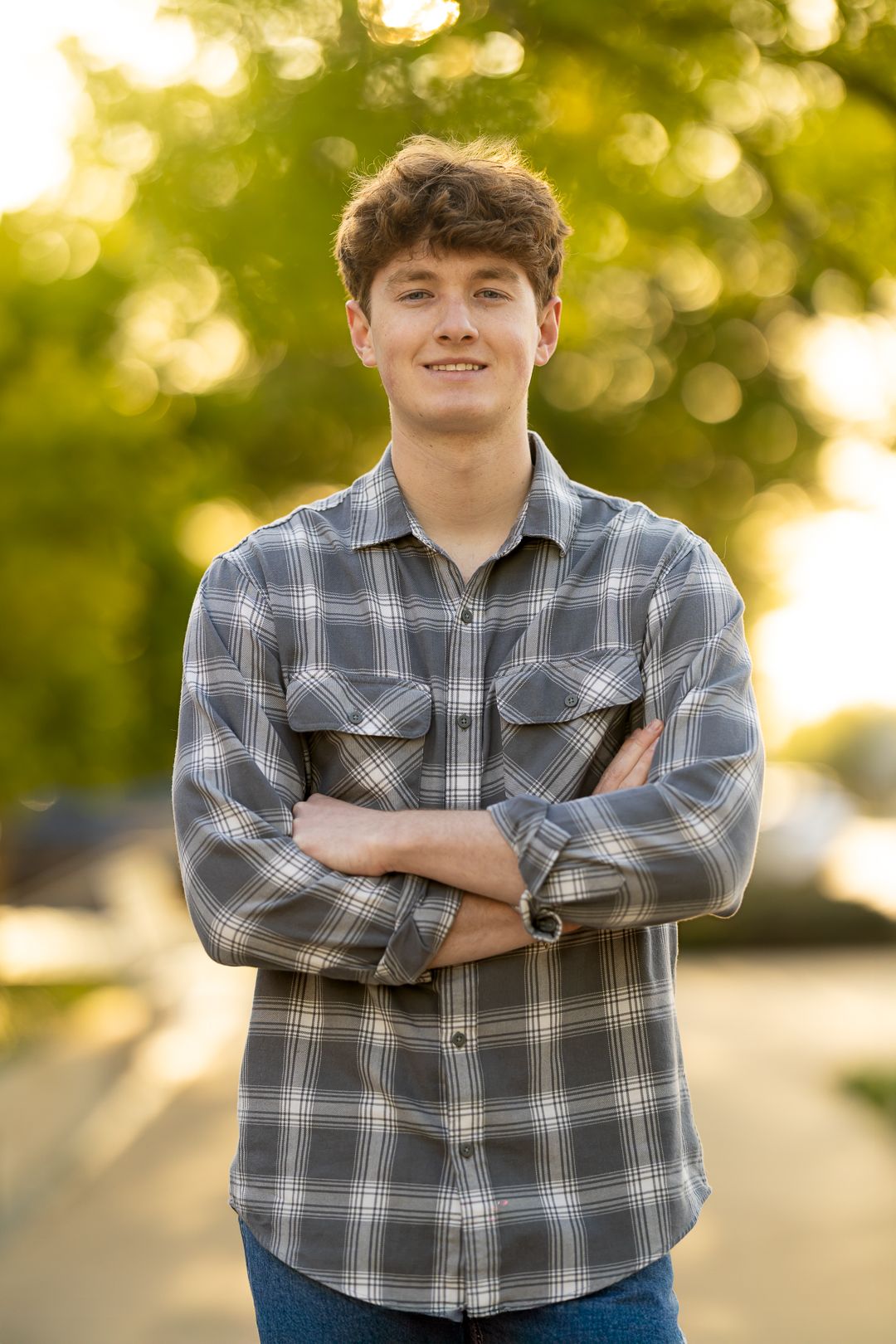 A series of outdoor portraits showing someone in a plaid flannel shirt against a sunlit natural background.