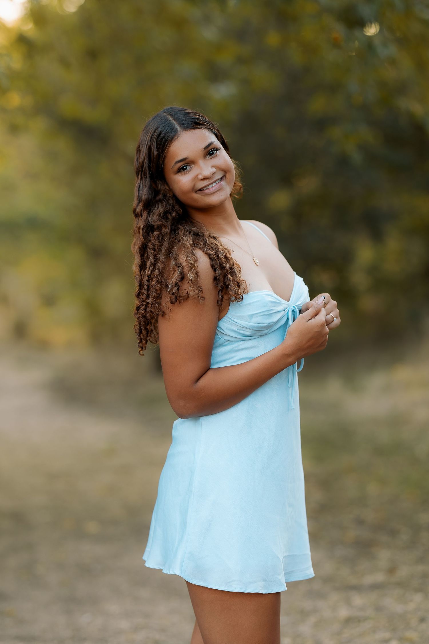 Idea for senior pictures light blue dress.  Fun poses for senior photos