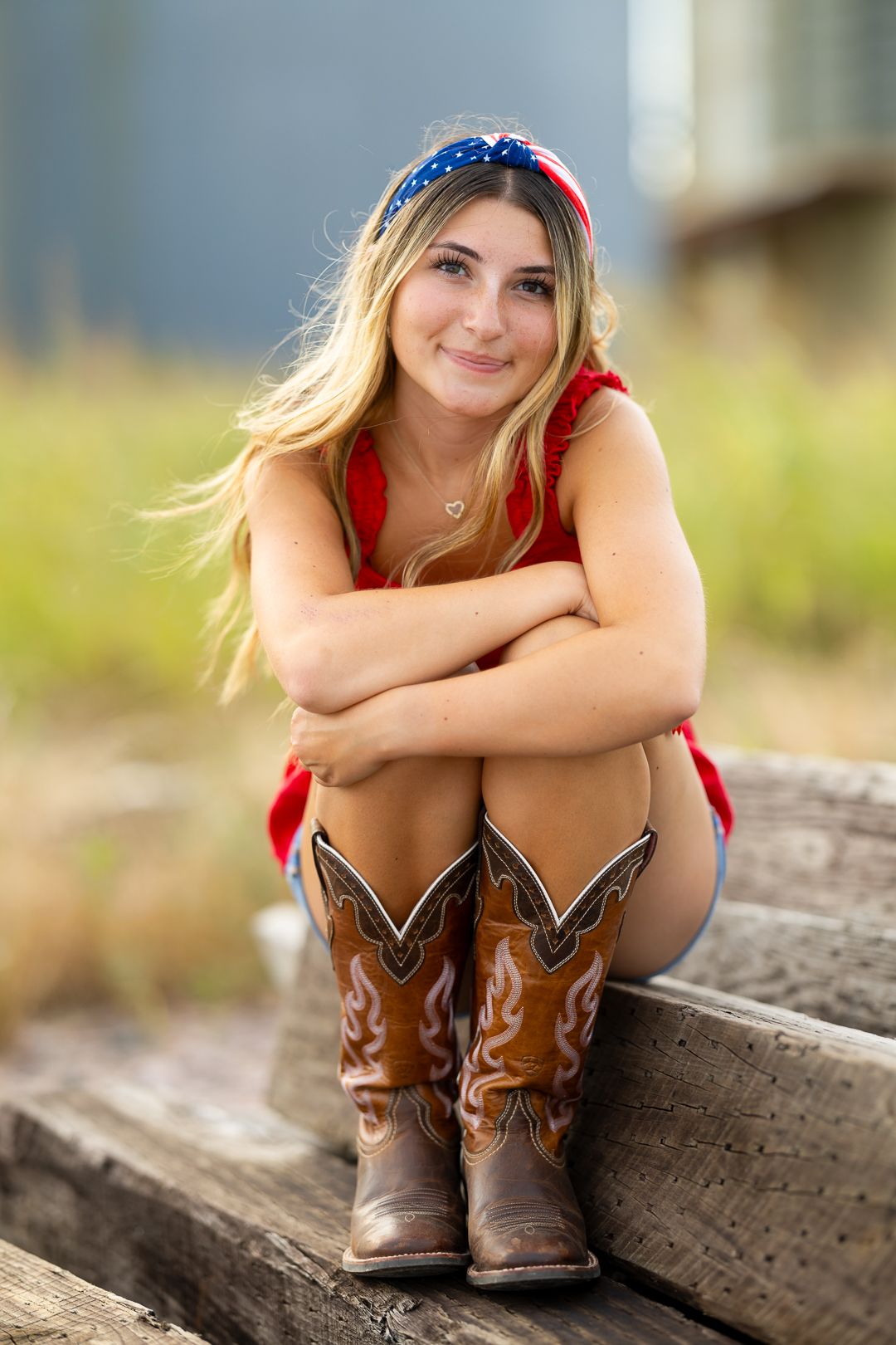 Brown cowboy boots shown in a series of outdoor portrait shots with soft natural lighting and rustic log backdrop.