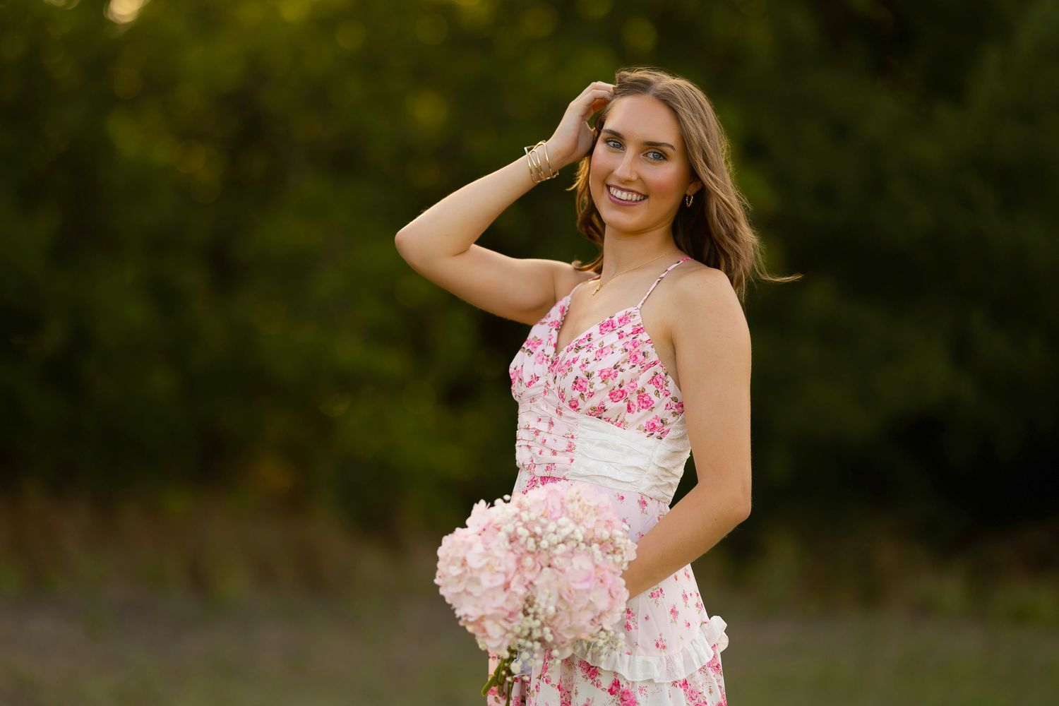 Senior Portrait in floral pink dress.  Summer golden hour session.  Frisco Texas.