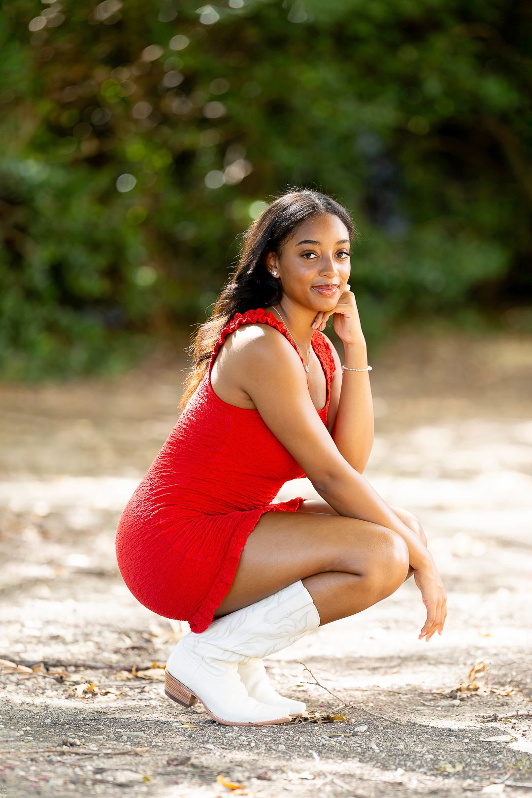 Outdoor photo sequence featuring a red top and white shorts ensemble on a sunny day.
