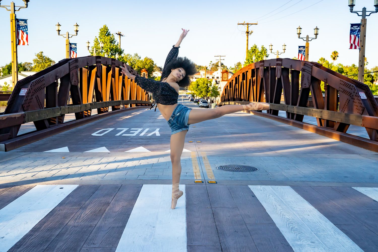 A sequence of skateboarding action shots showing tricks performed at an urban crosswalk location.