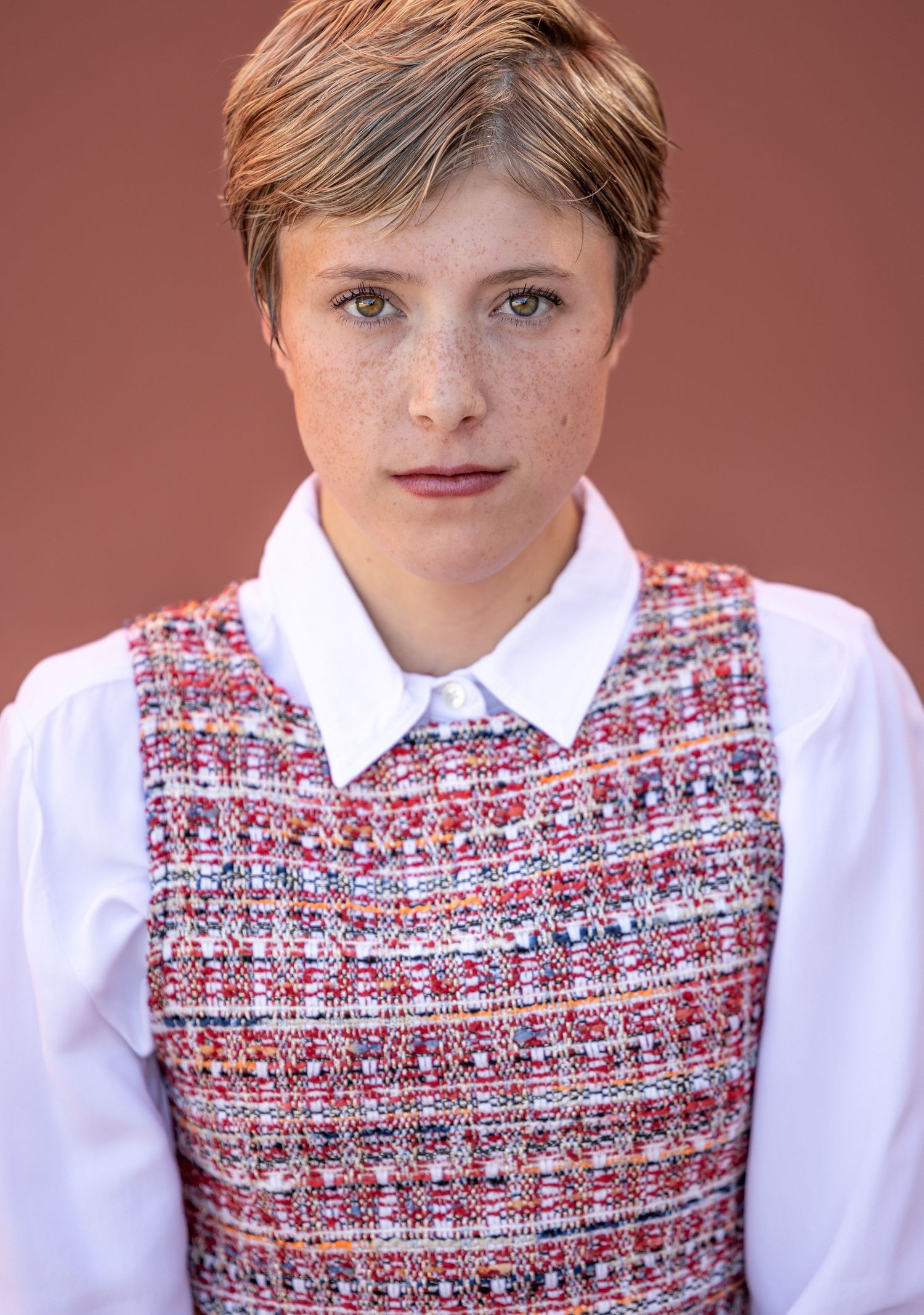 Girl with short hair - office girl. headshot