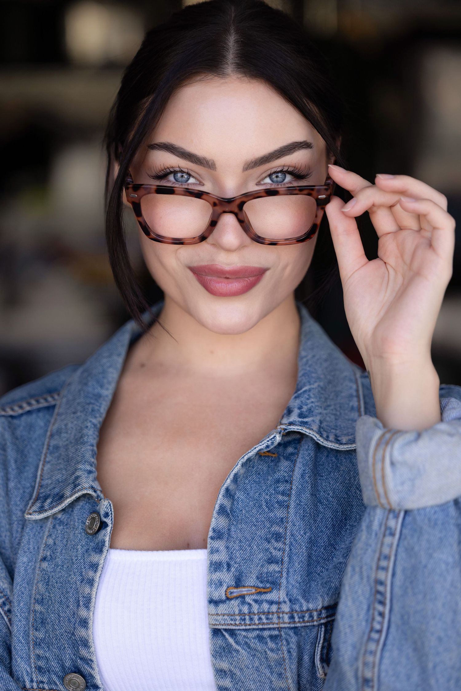 gamer girl , office girl headshot. Casual portraits in denim jacket and glasses with playful expressions.