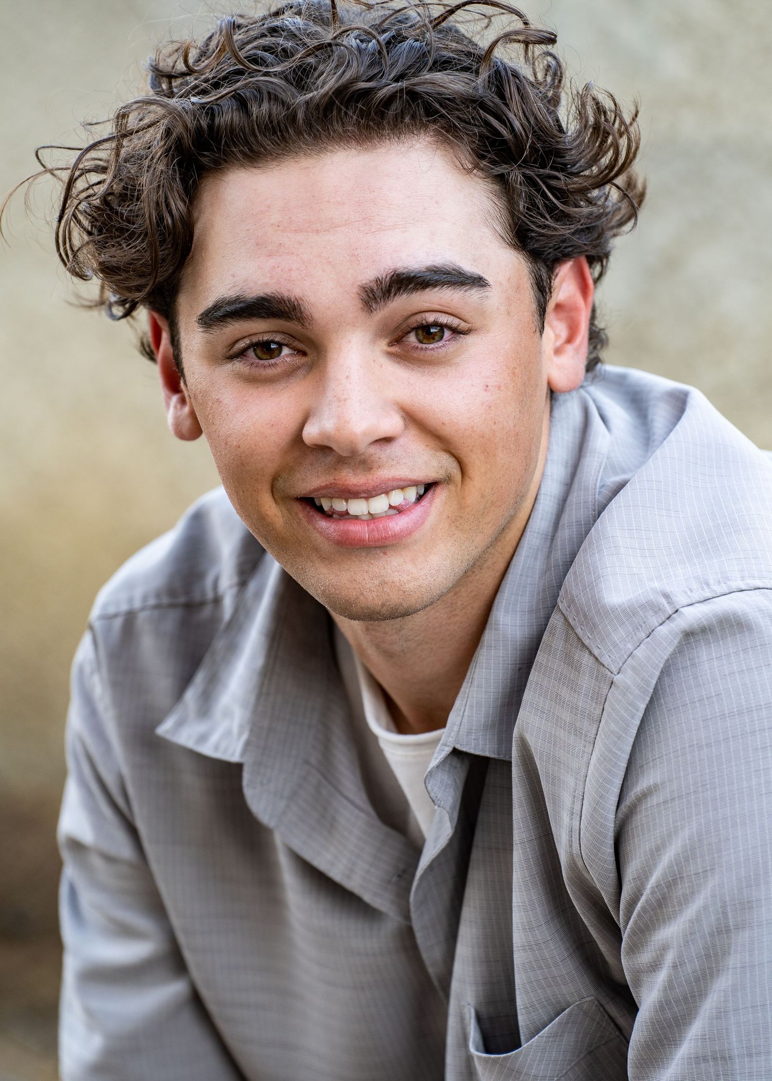 teen boy headshot outdoors.