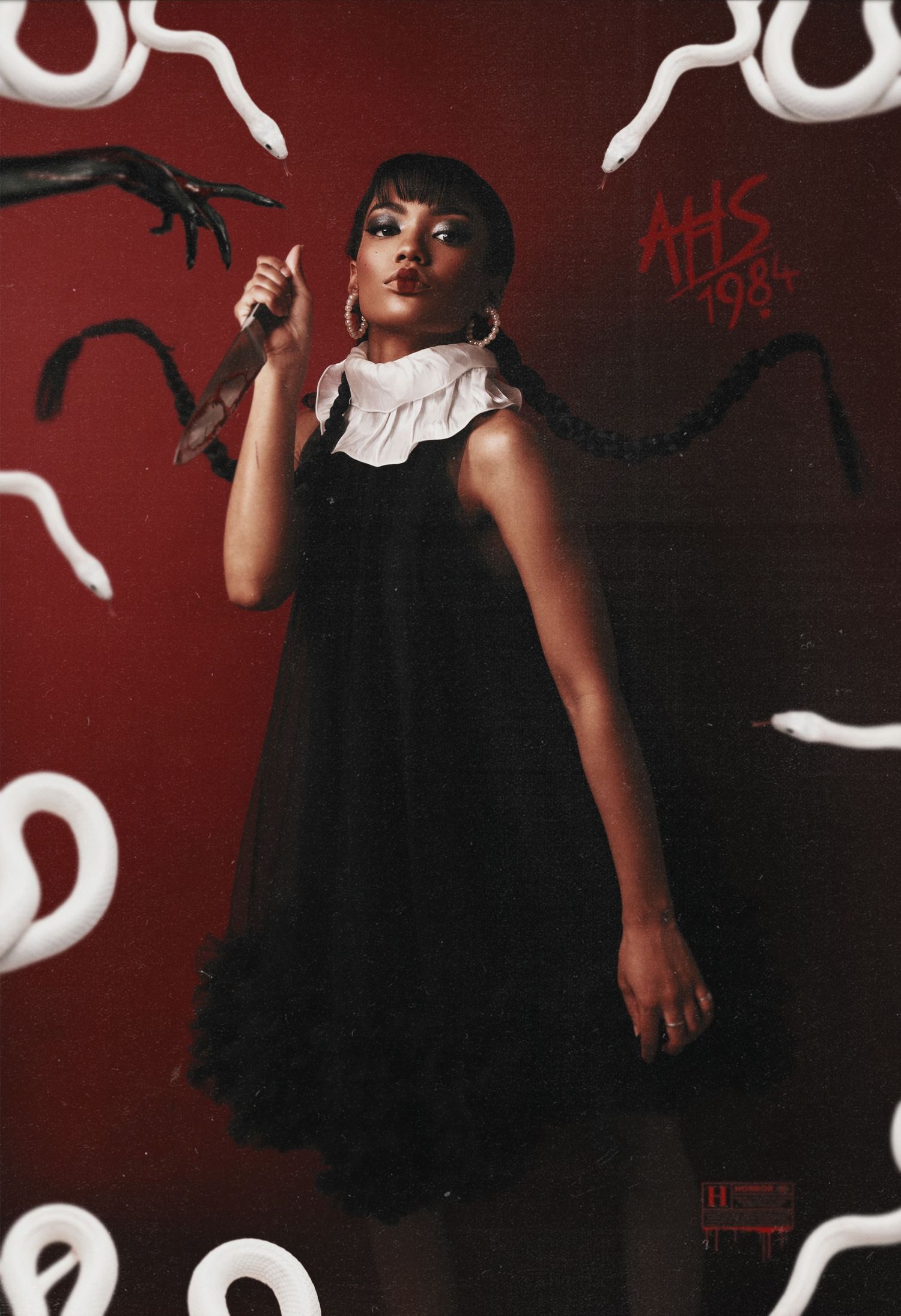 Dark themed photo with gothic elements featuring a black dress and white collar.