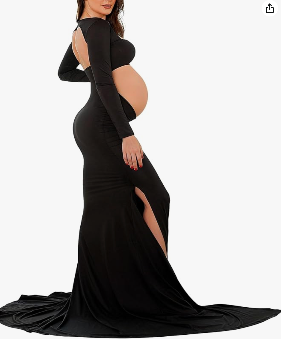 Pregnant woman in black open-side maternity gown with long train and side slit.