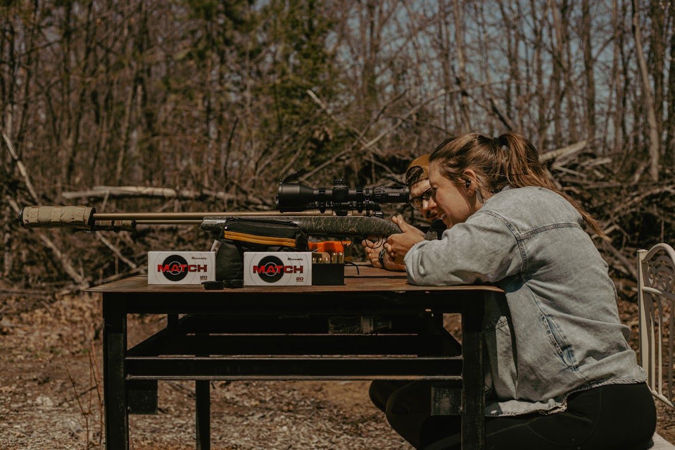 A collection of rustic outdoor scenes with archery targets and people practicing archery in a wooded setting.