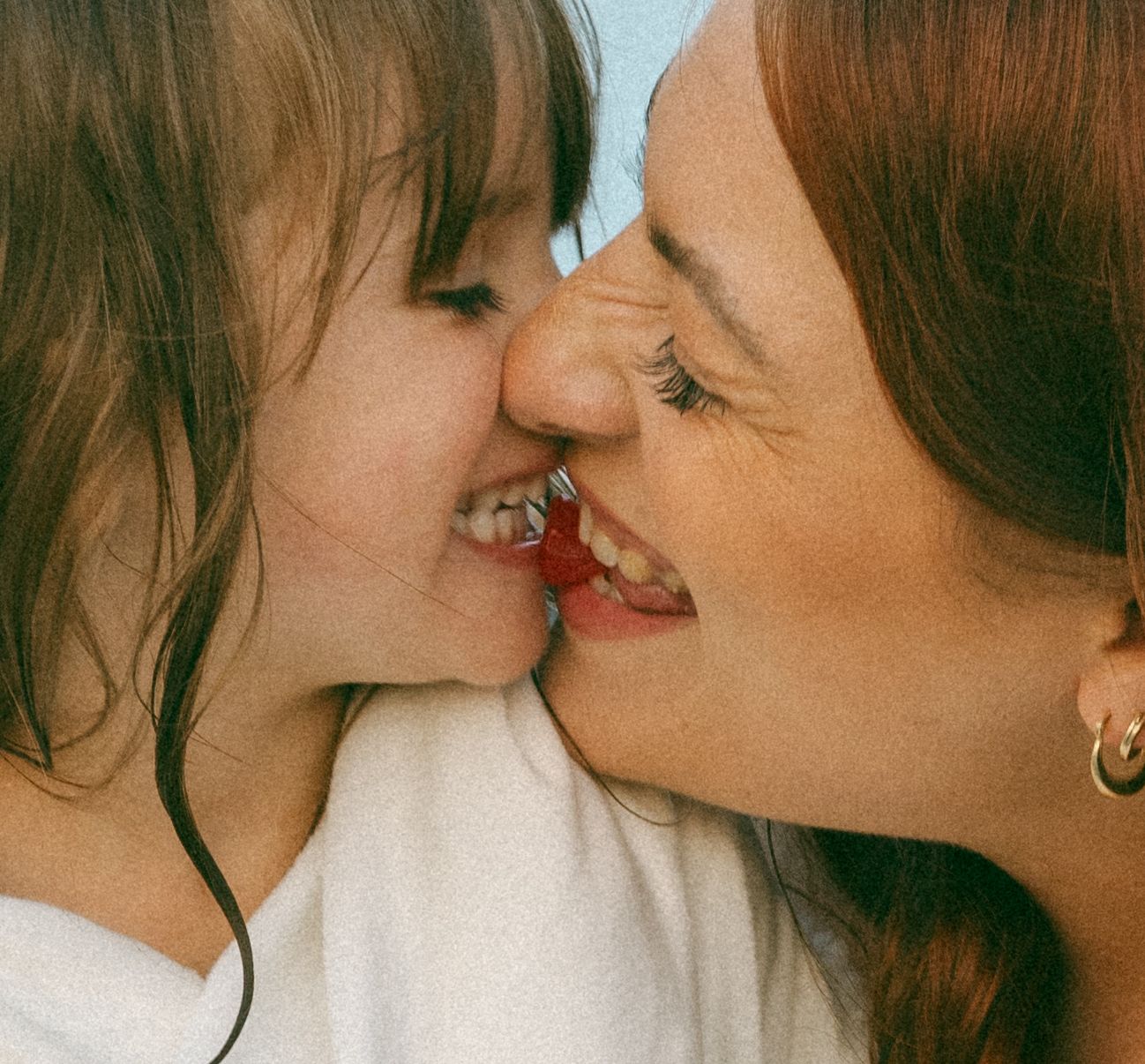 Close up series of an intimate moment between mother and daughter.