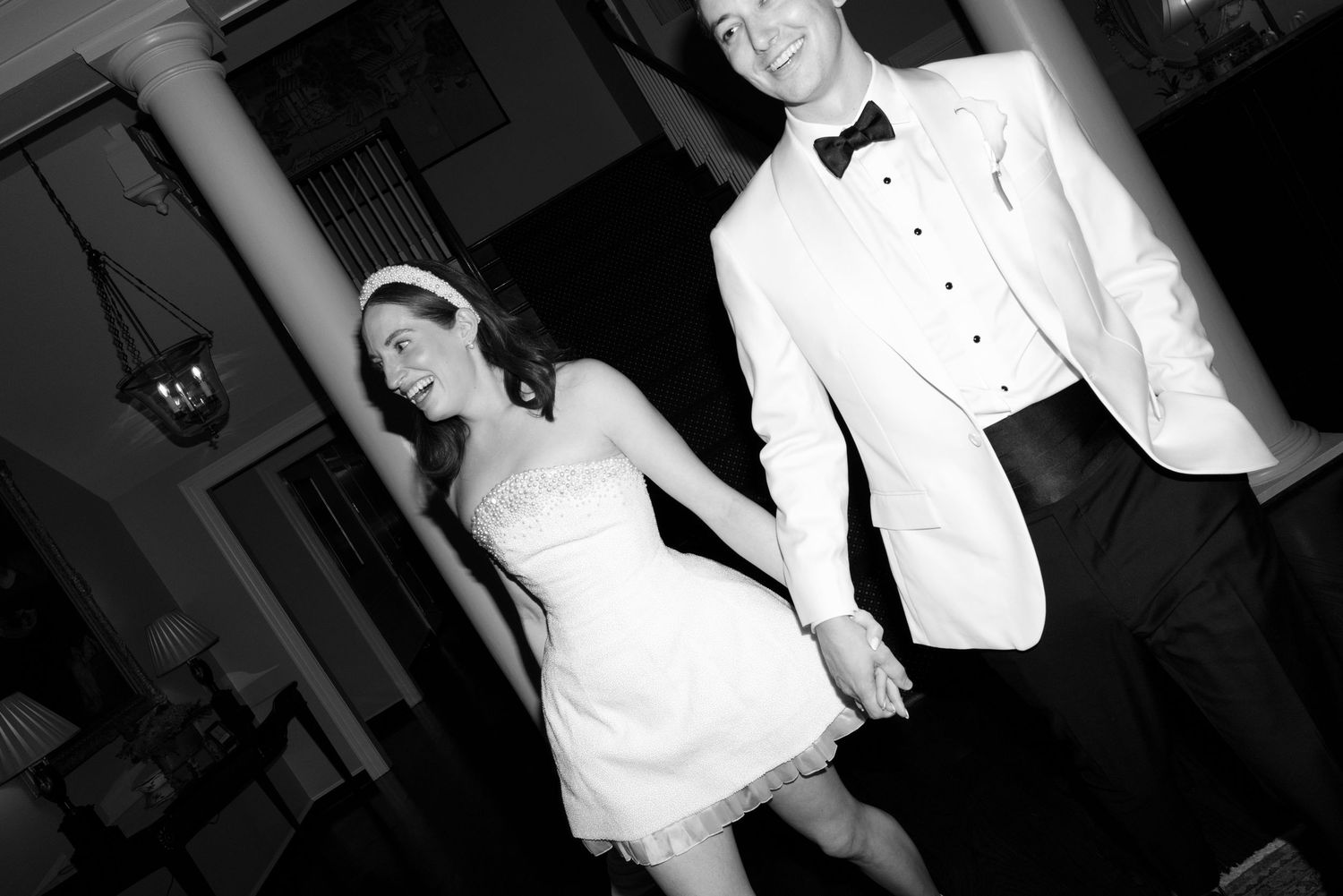 Black and white photos show a formal event with people in elegant attire dancing and celebrating.
