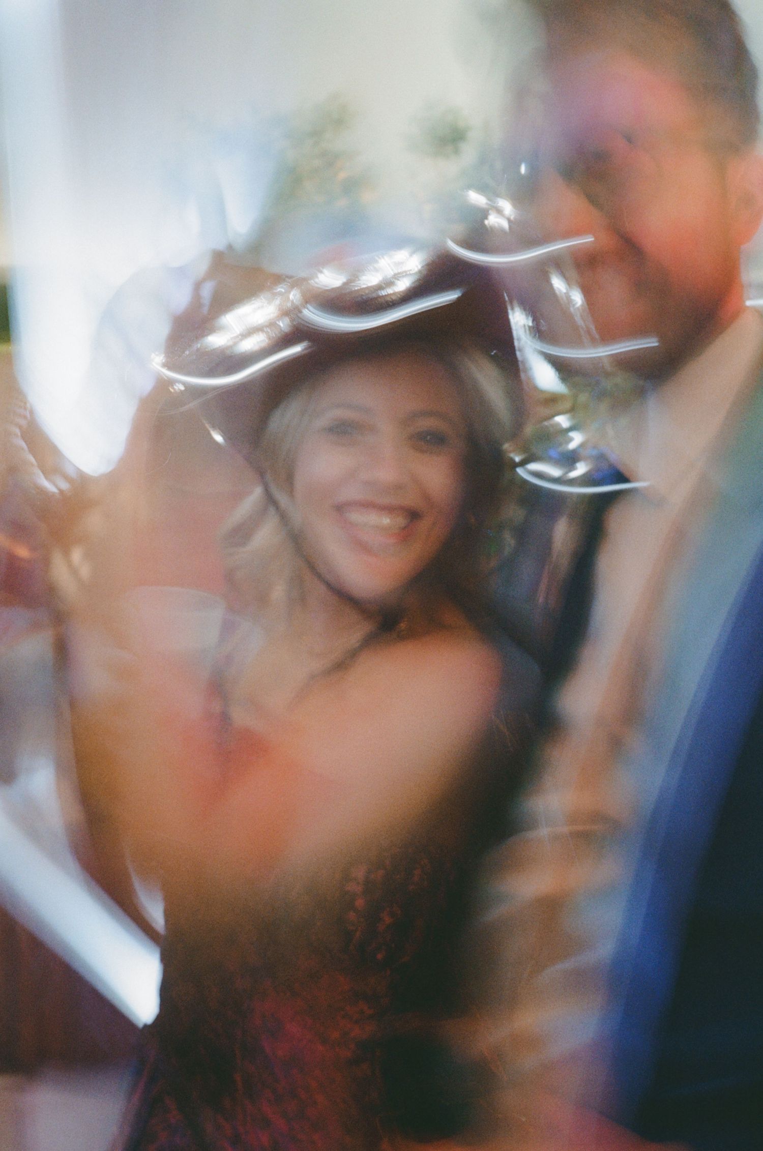 Blurry abstract motion sequence showing people dancing and celebrating at a party or event.