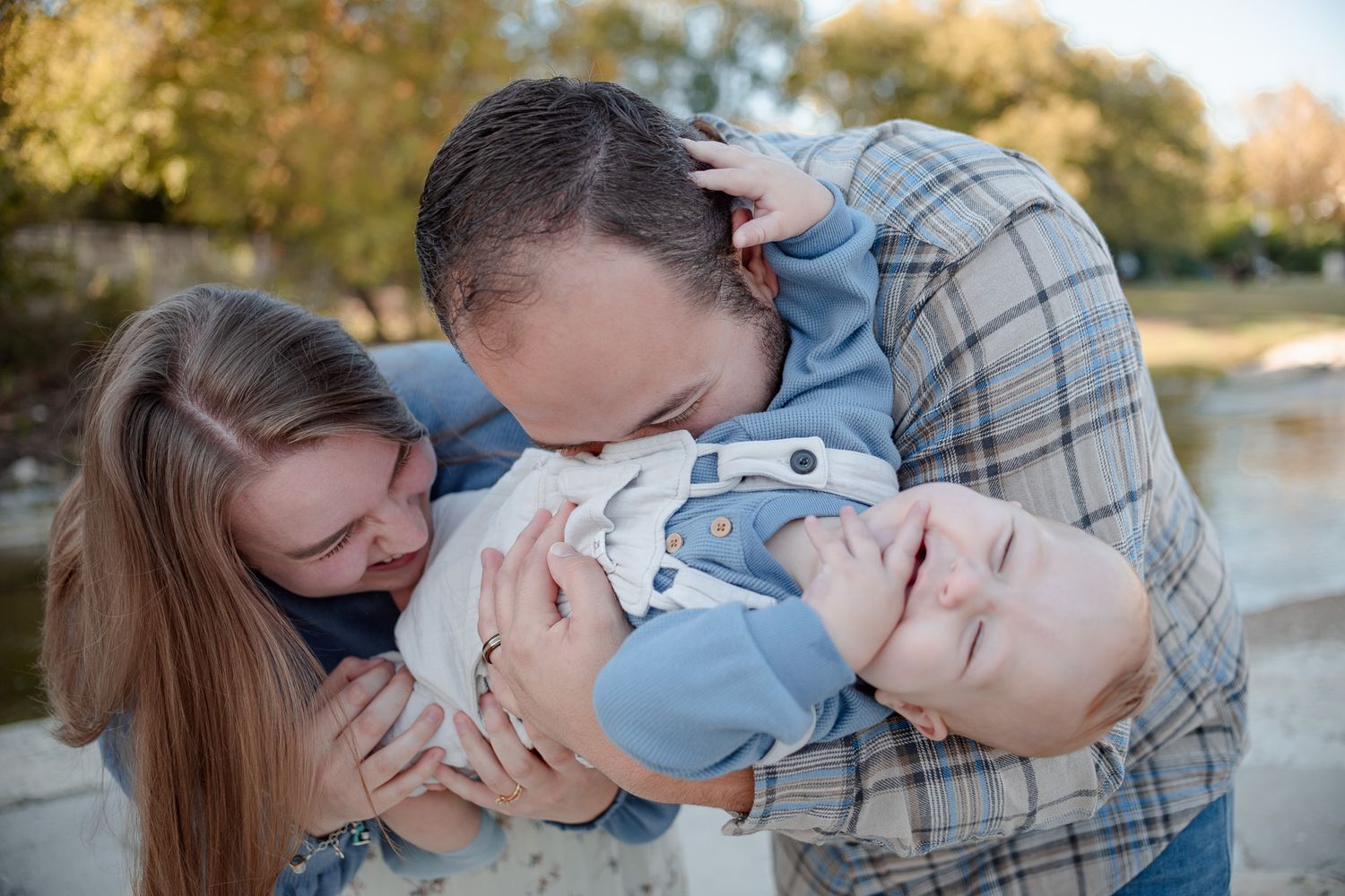 Family playing together during session at Nolan Creek in Belton Texas