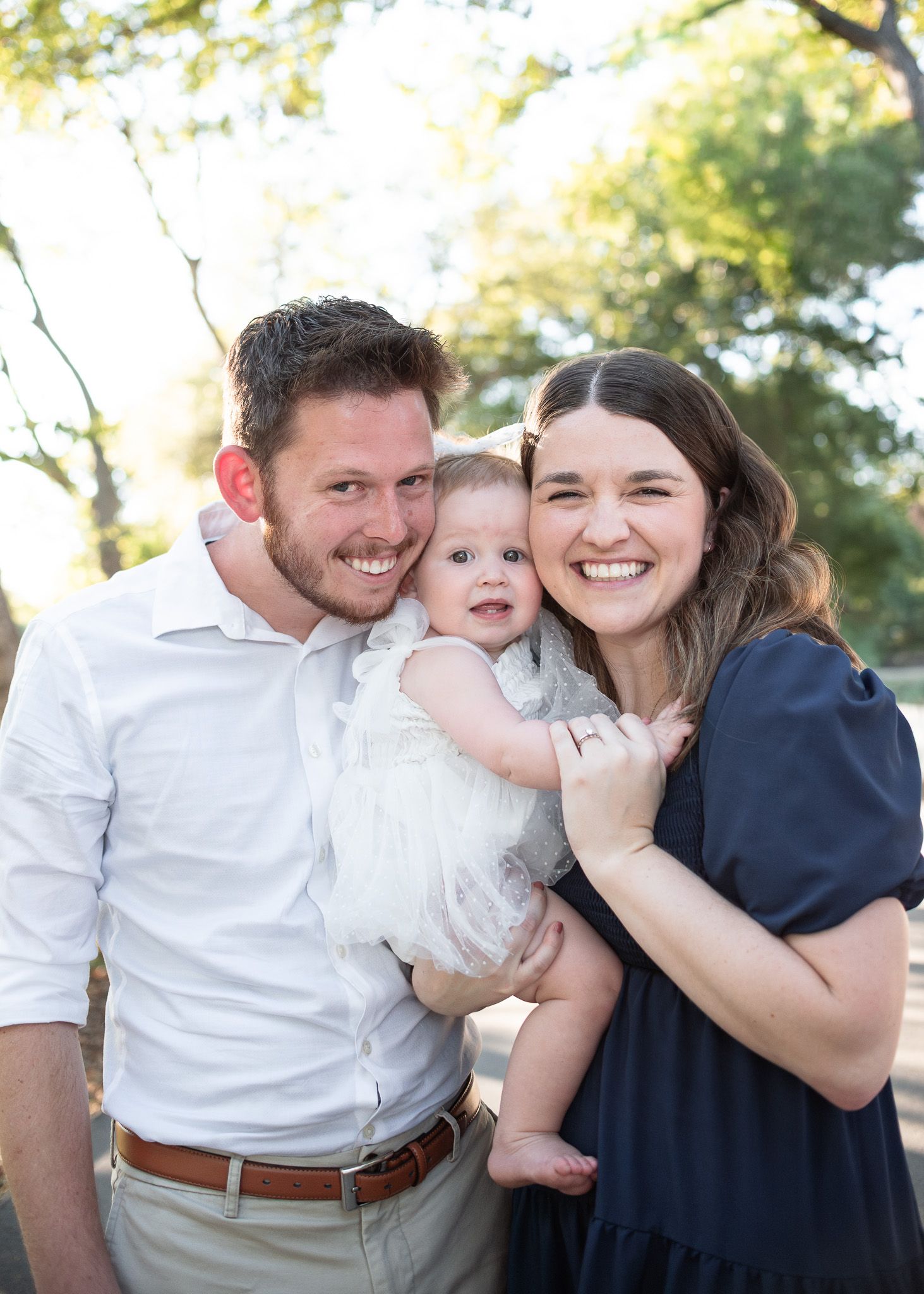 Family smiling together during session at Pace Park in Salado Texas