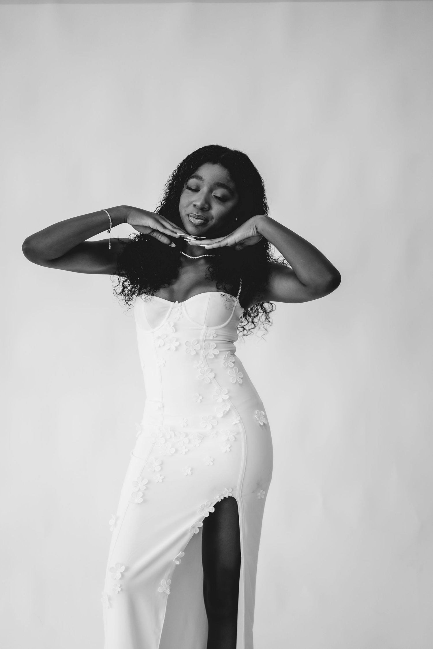 Artistic black and white series showing expressive hand movements and poses.