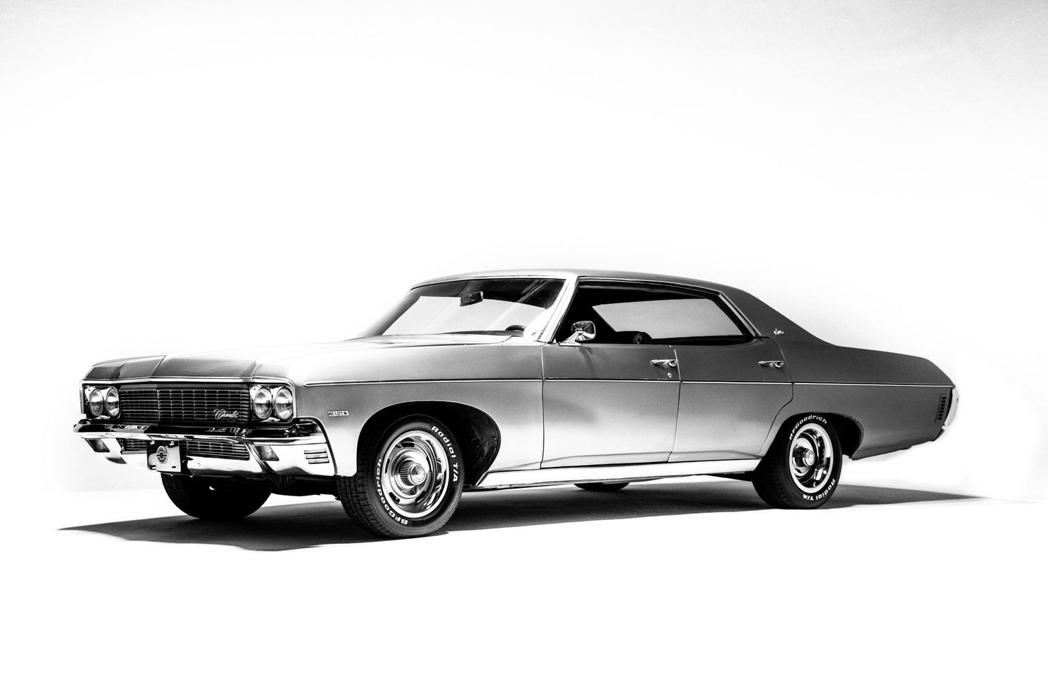 Vintage car silhouettes showing classic American automobiles in profile view.
