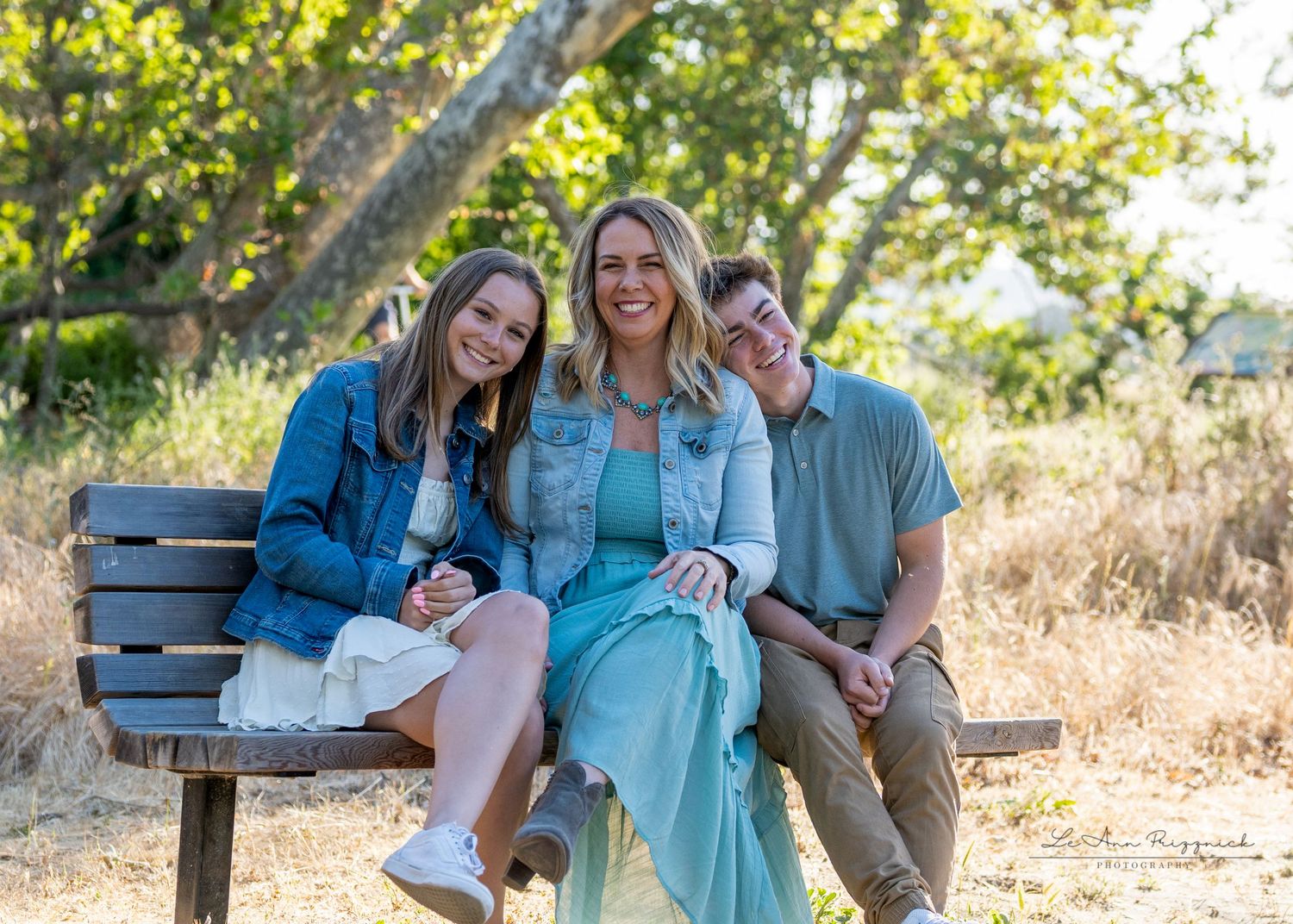 Family portrait where the kids, even almost grown, can still lean on mom